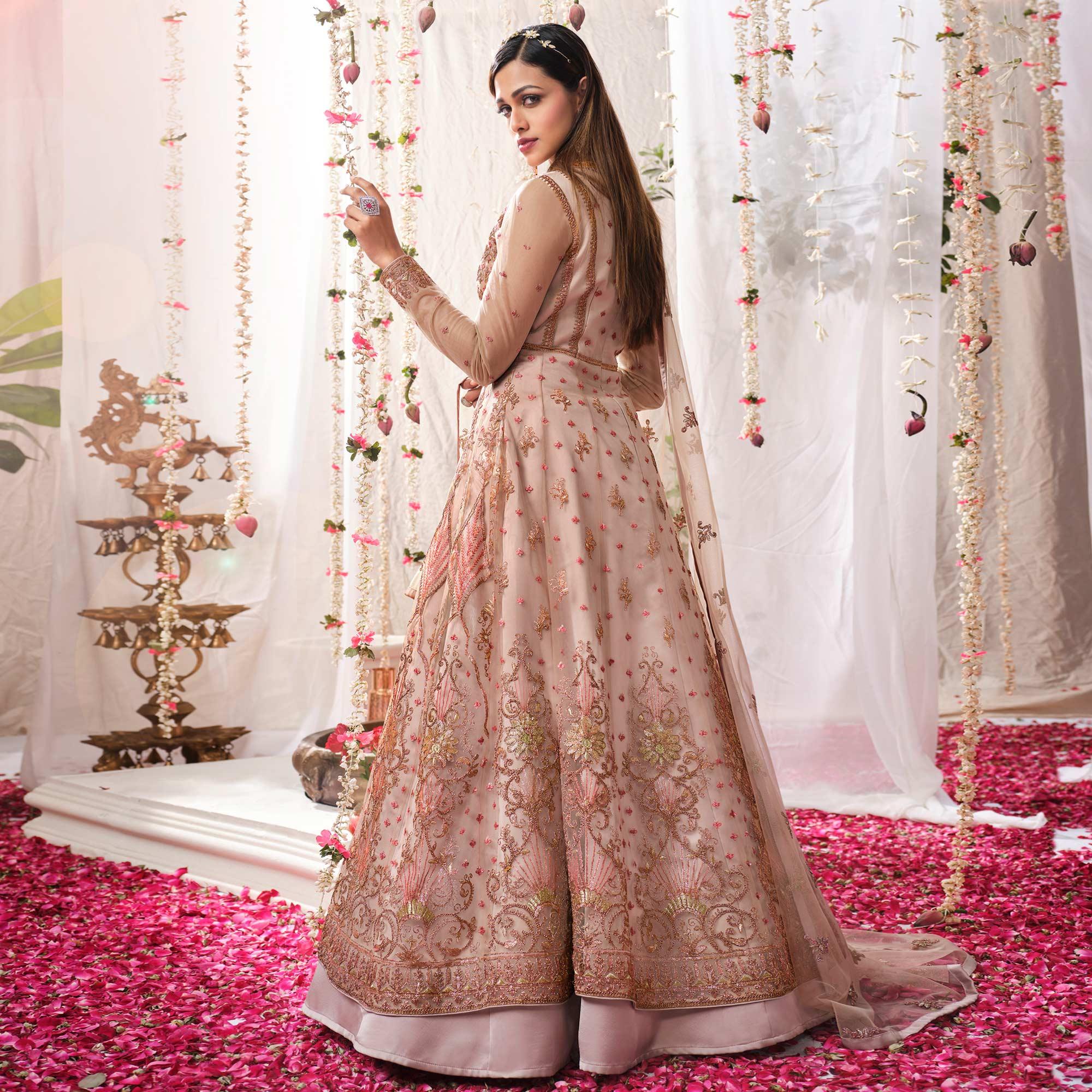 Mauve Partywear Sequence Embroidered Net Gown - Peachmode