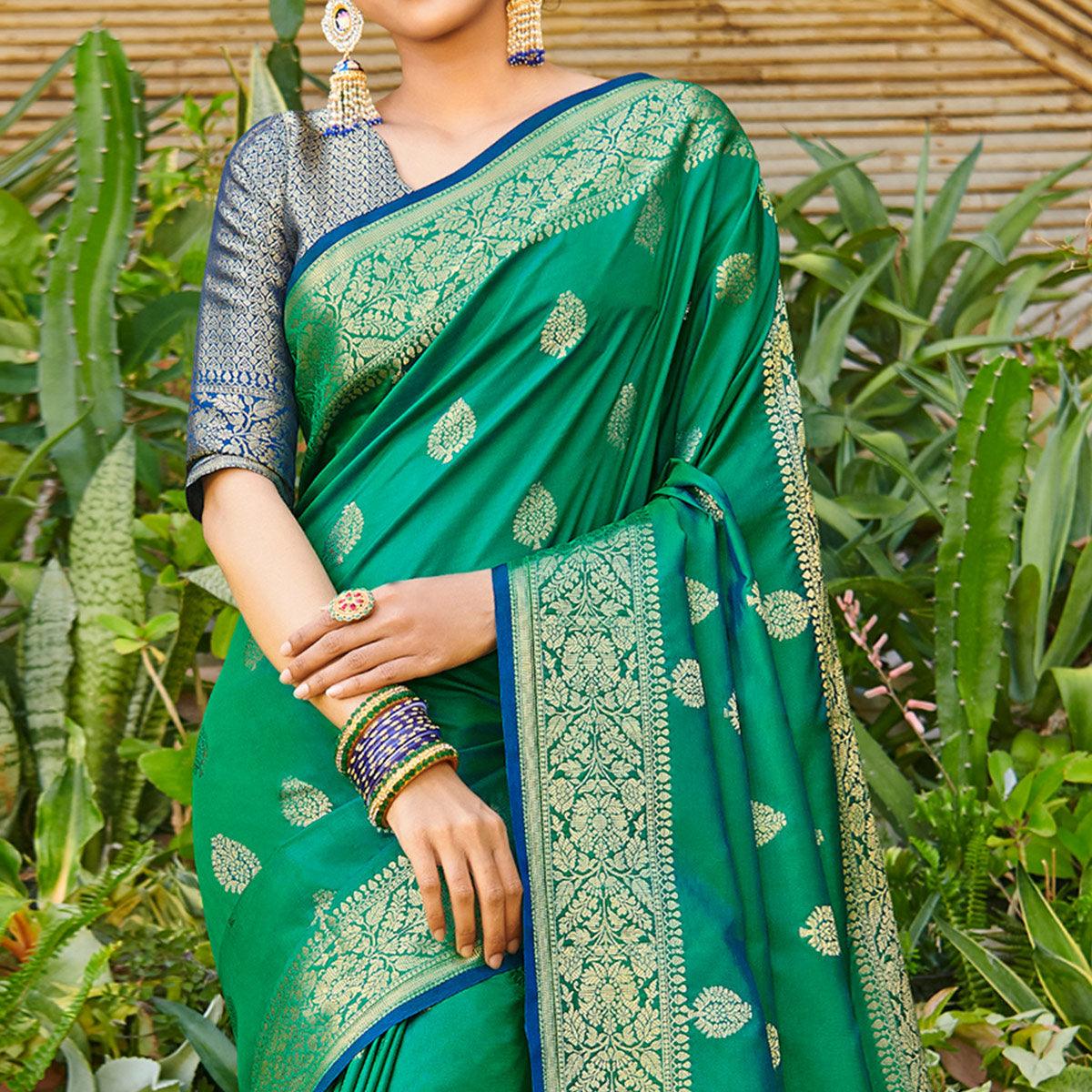 Mesmeric Green Colored Festive Wear Woven Silk Saree - Peachmode