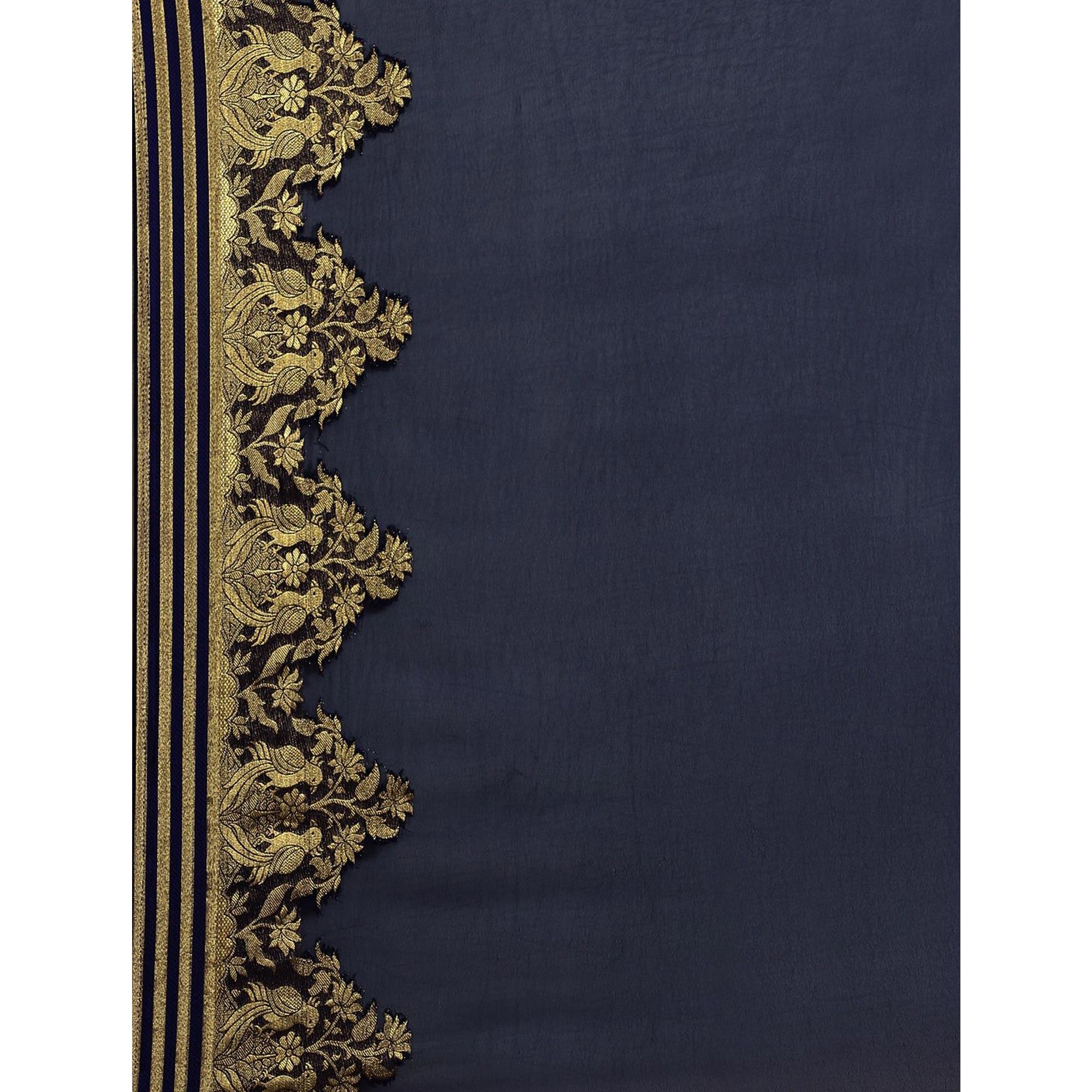 Mesmeric Navy Blue Colored Festive Wear Woven Chiffon Saree - Peachmode