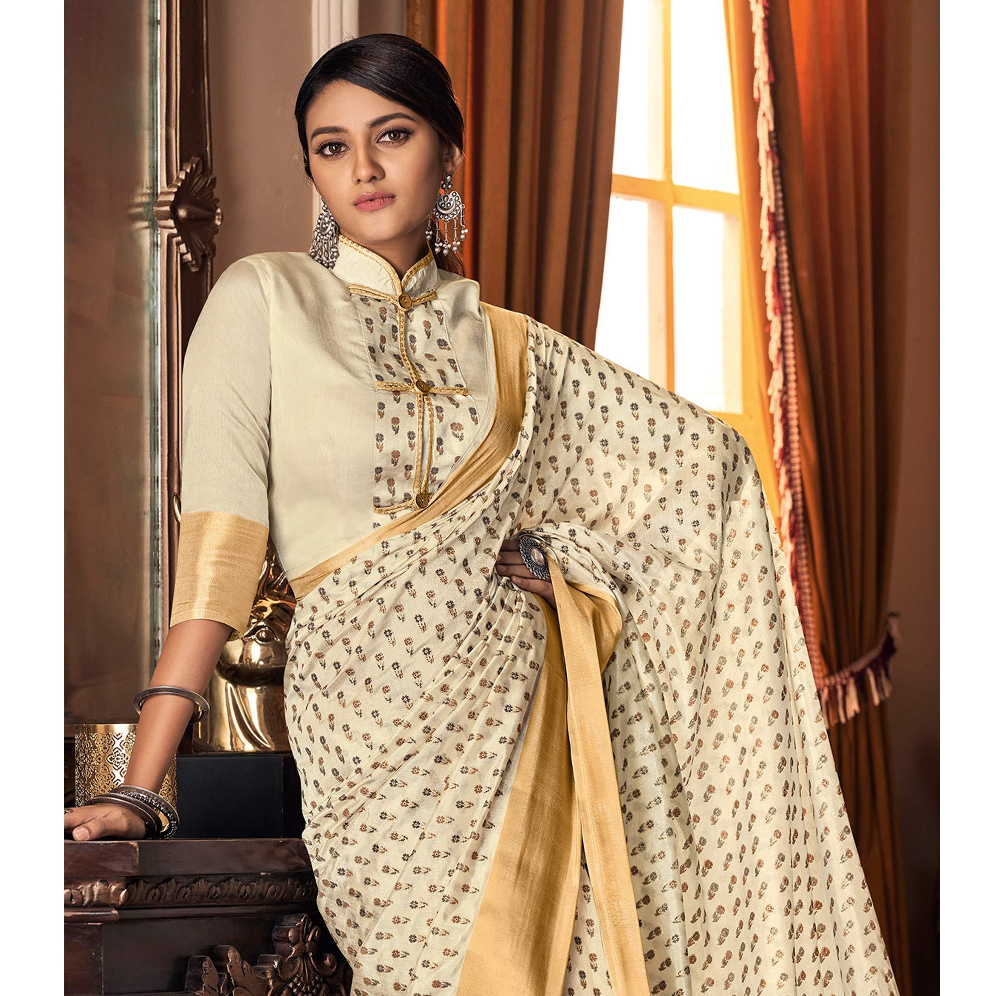 Mesmerising Cream Colored Festive Wear Printed And Woven Border Silk Saree - Peachmode
