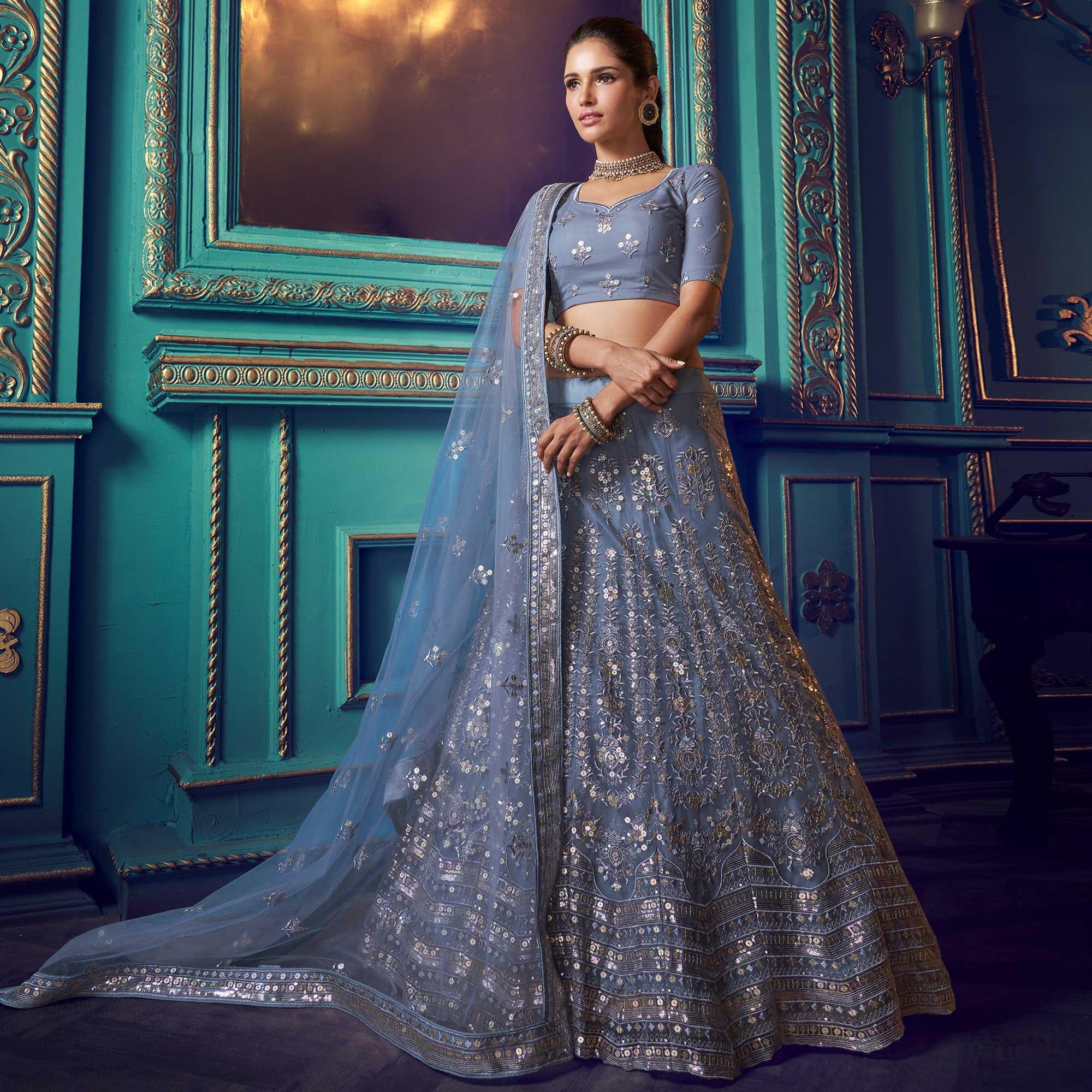 Mesmerising Grey Colored Partywear Embroidered Soft Net Lehenga Choli - Peachmode