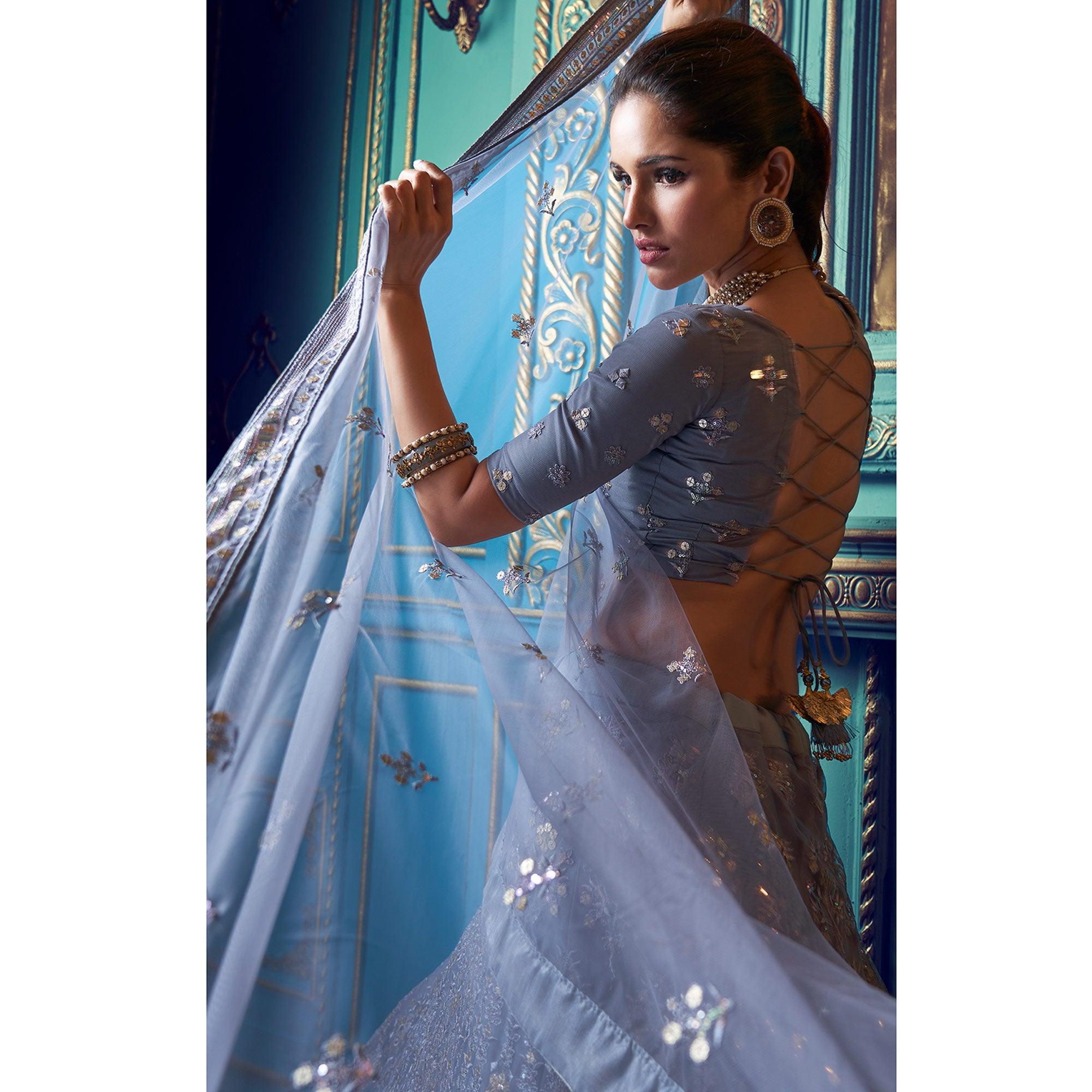 Mesmerising Grey Colored Partywear Embroidered Soft Net Lehenga Choli - Peachmode