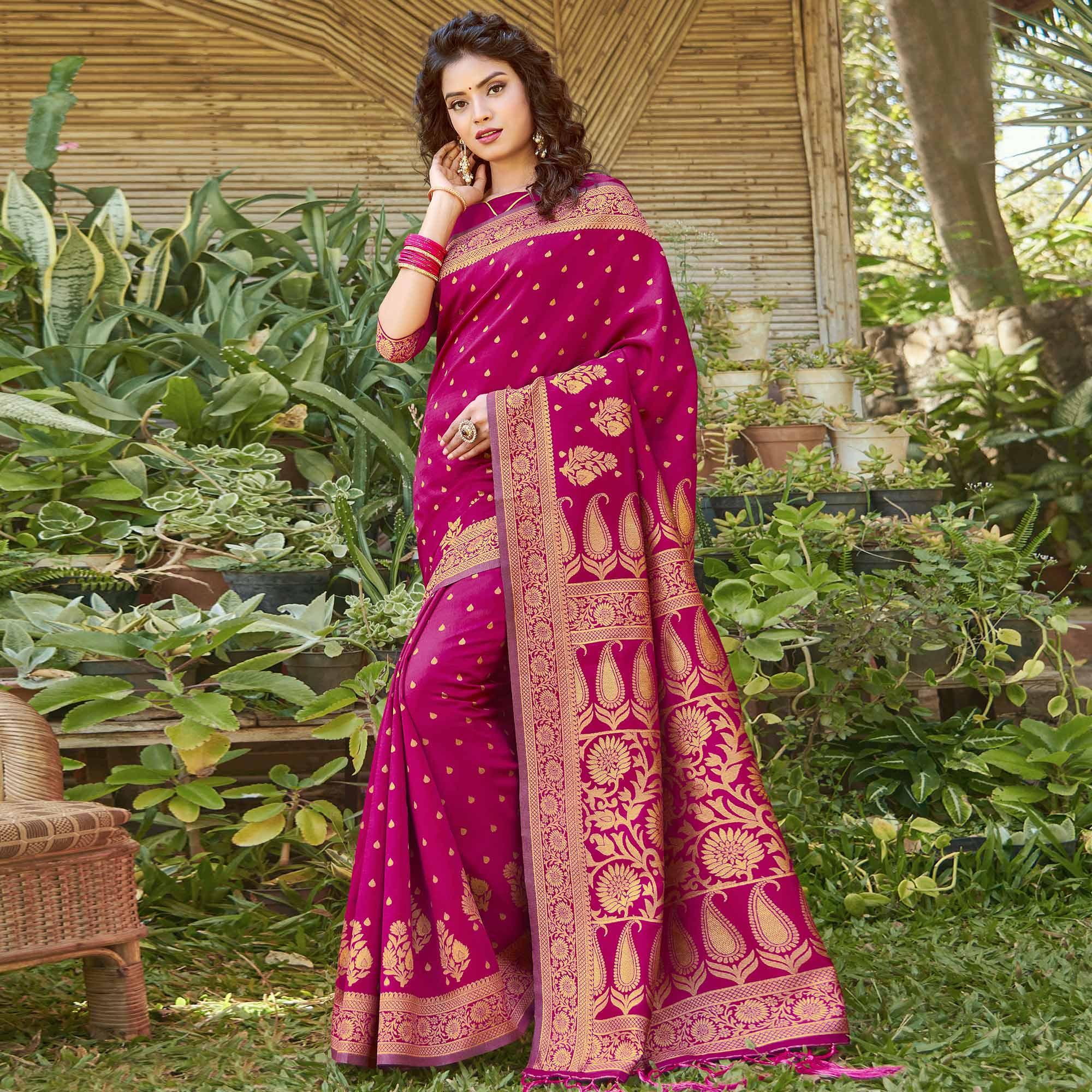 Mesmerising Magenta Pink Colored Festive Wear Floral Woven Silk Blend Saree With Tassels - Peachmode
