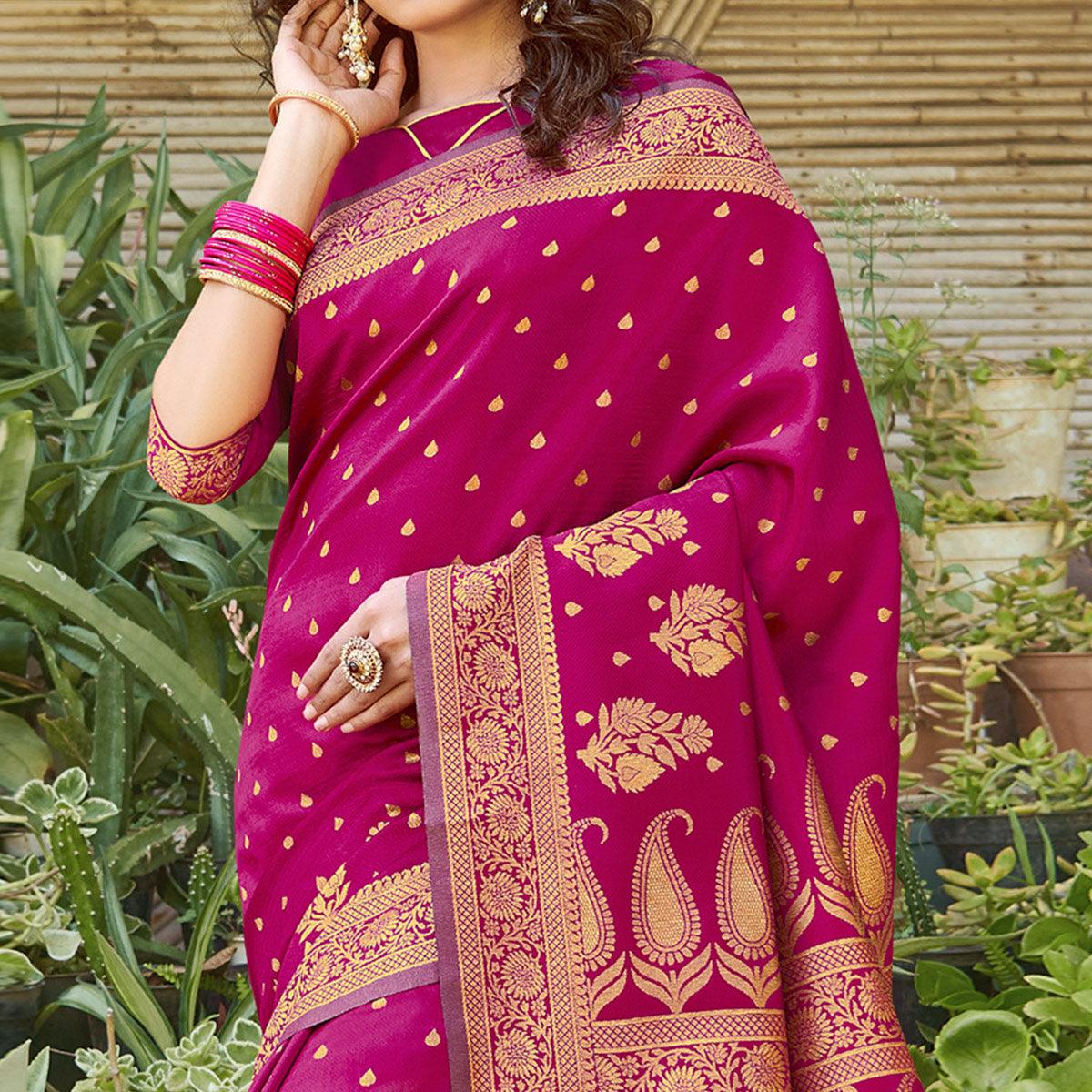 Mesmerising Magenta Pink Colored Festive Wear Floral Woven Silk Blend Saree With Tassels - Peachmode