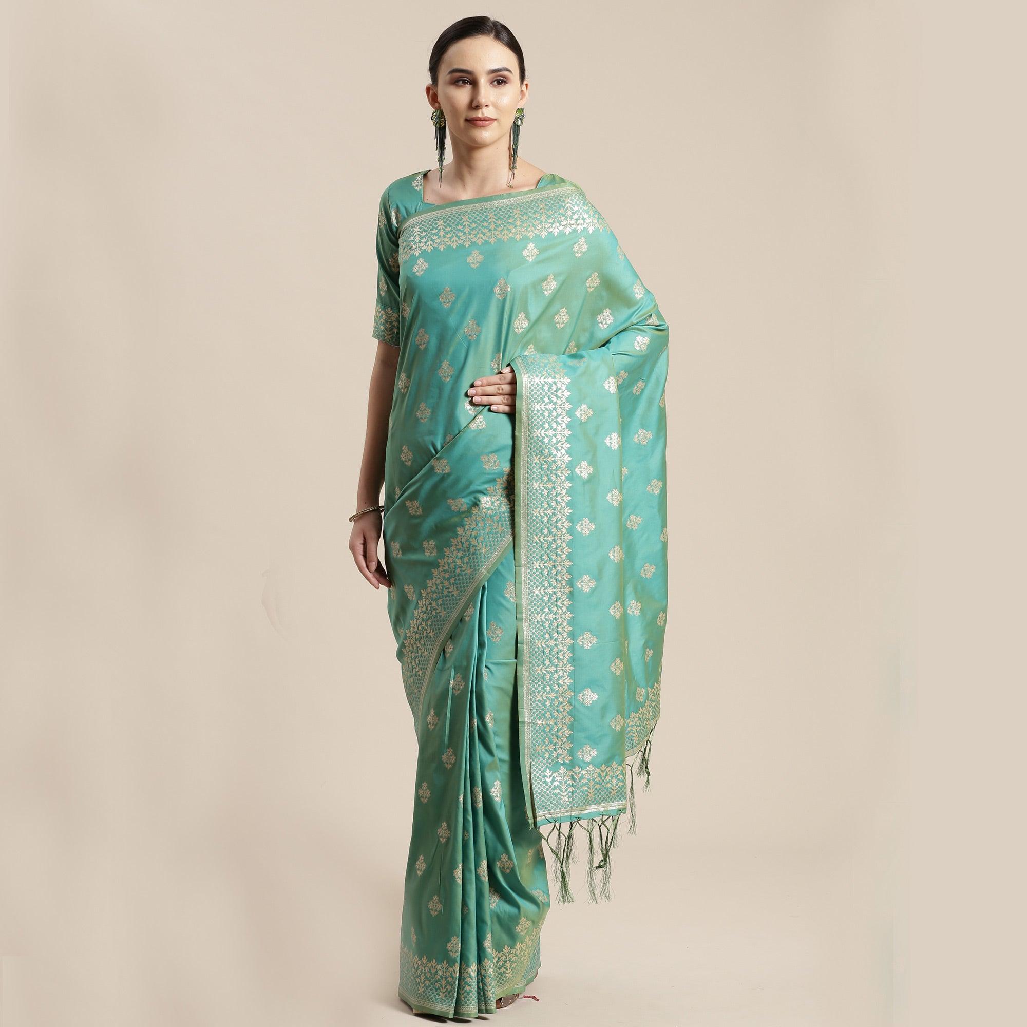 Mesmerising Sea Green Colored Festive Wear Silk Blend Woven Floral Saree With Tassels - Peachmode
