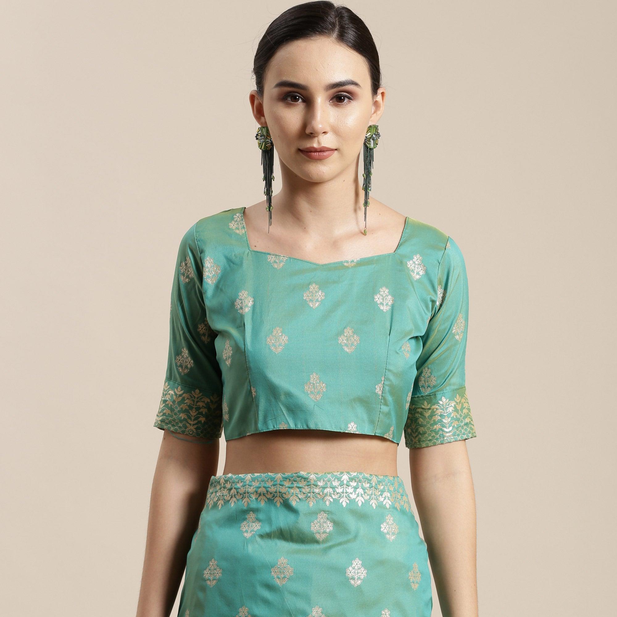 Mesmerising Sea Green Colored Festive Wear Silk Blend Woven Floral Saree With Tassels - Peachmode