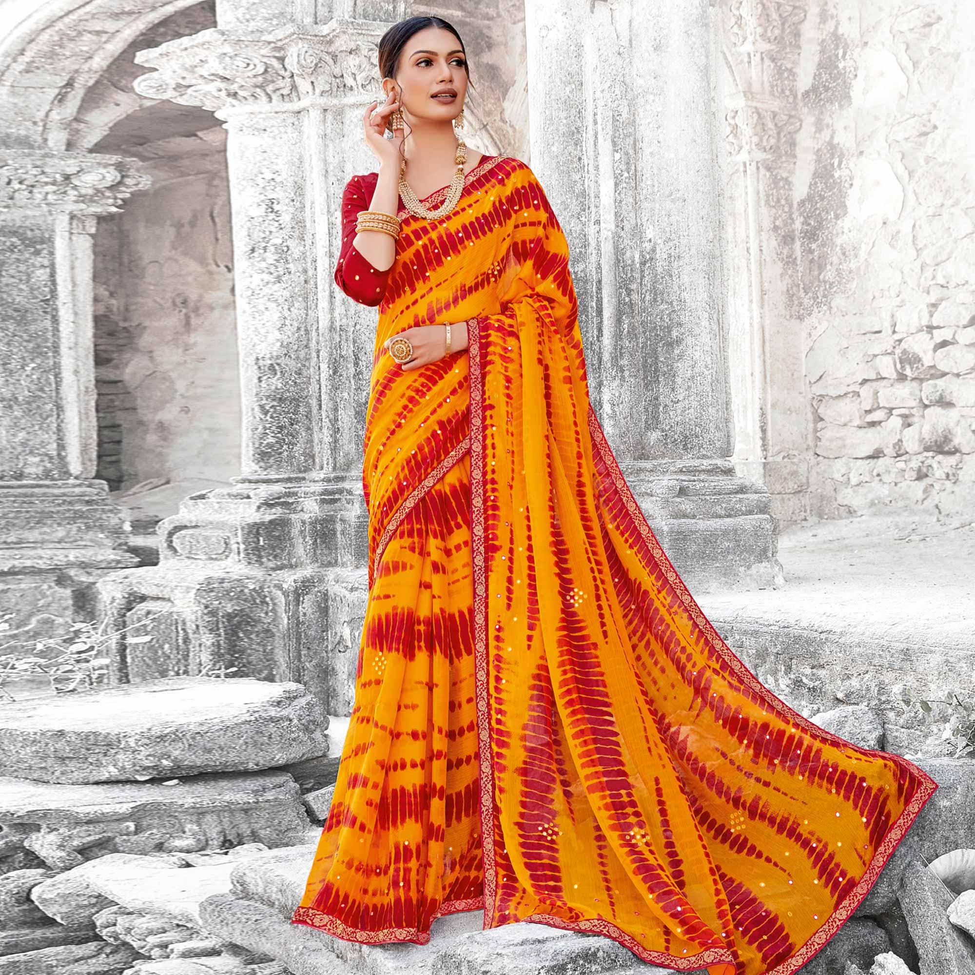 Mesmerising Yellow & Red Coloured Partywear Embellished Chiffon Saree - Peachmode