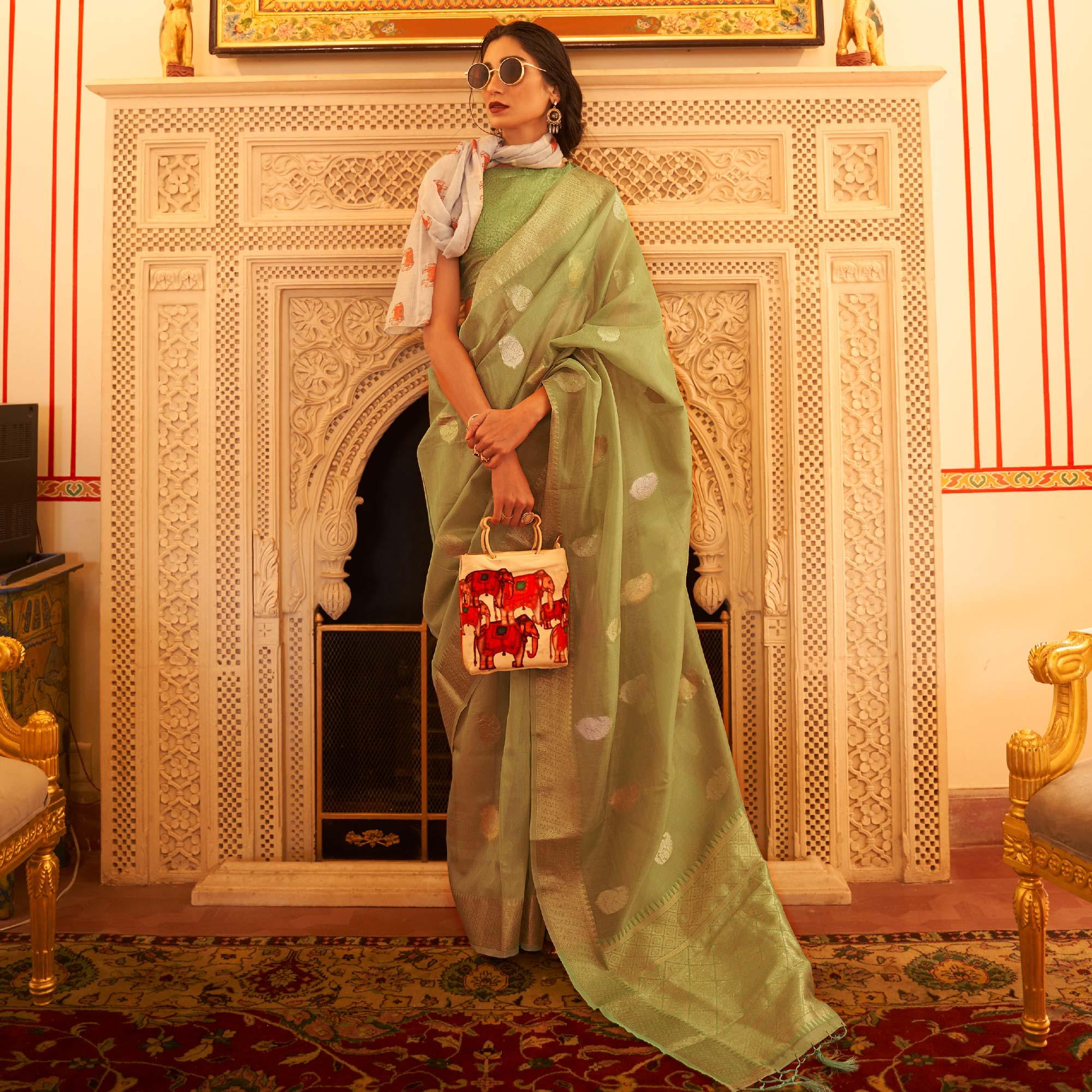 Mint Green Woven Linen Saree With Tassels - Peachmode