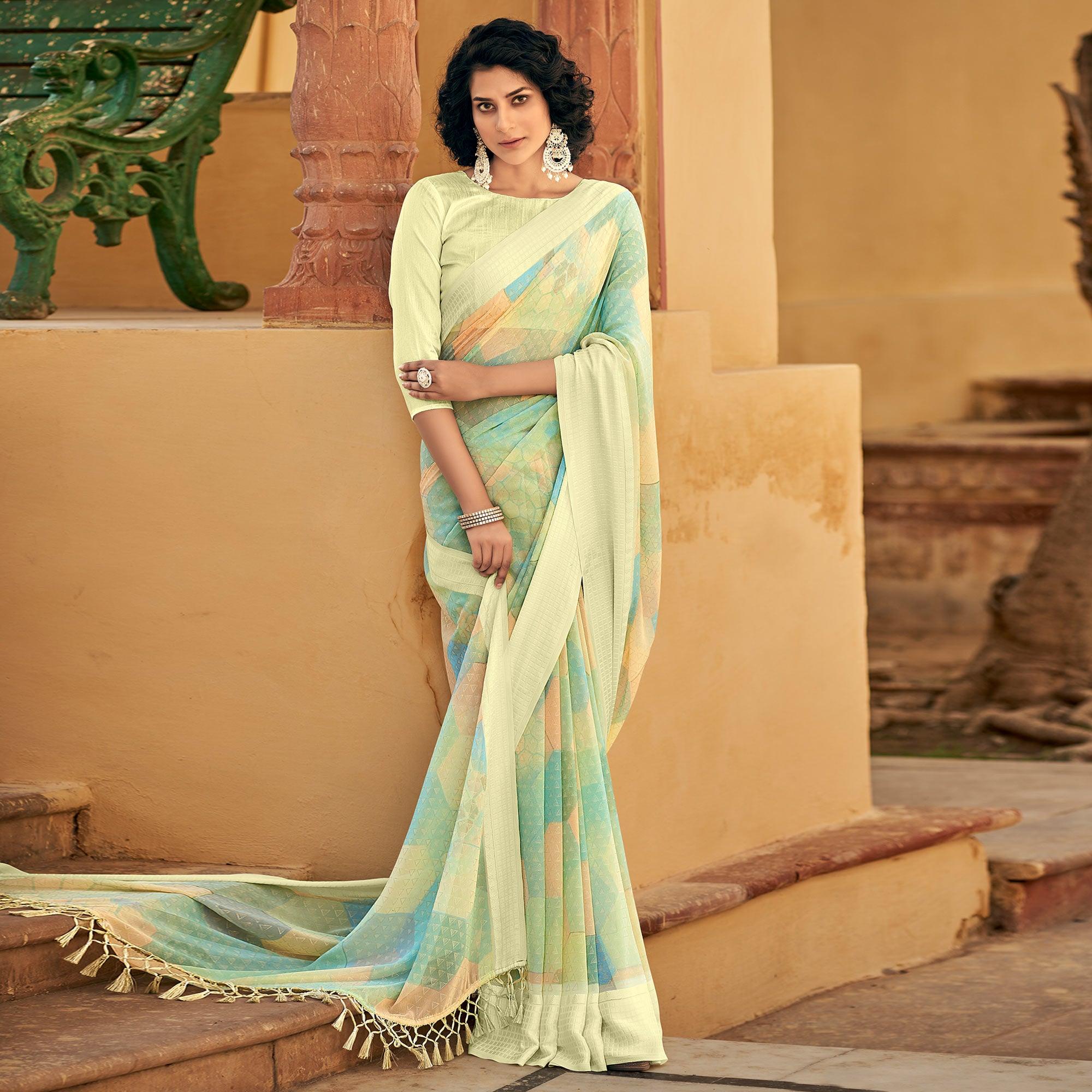 Multicolor Printed Georgette Saree With Tassels - Peachmode