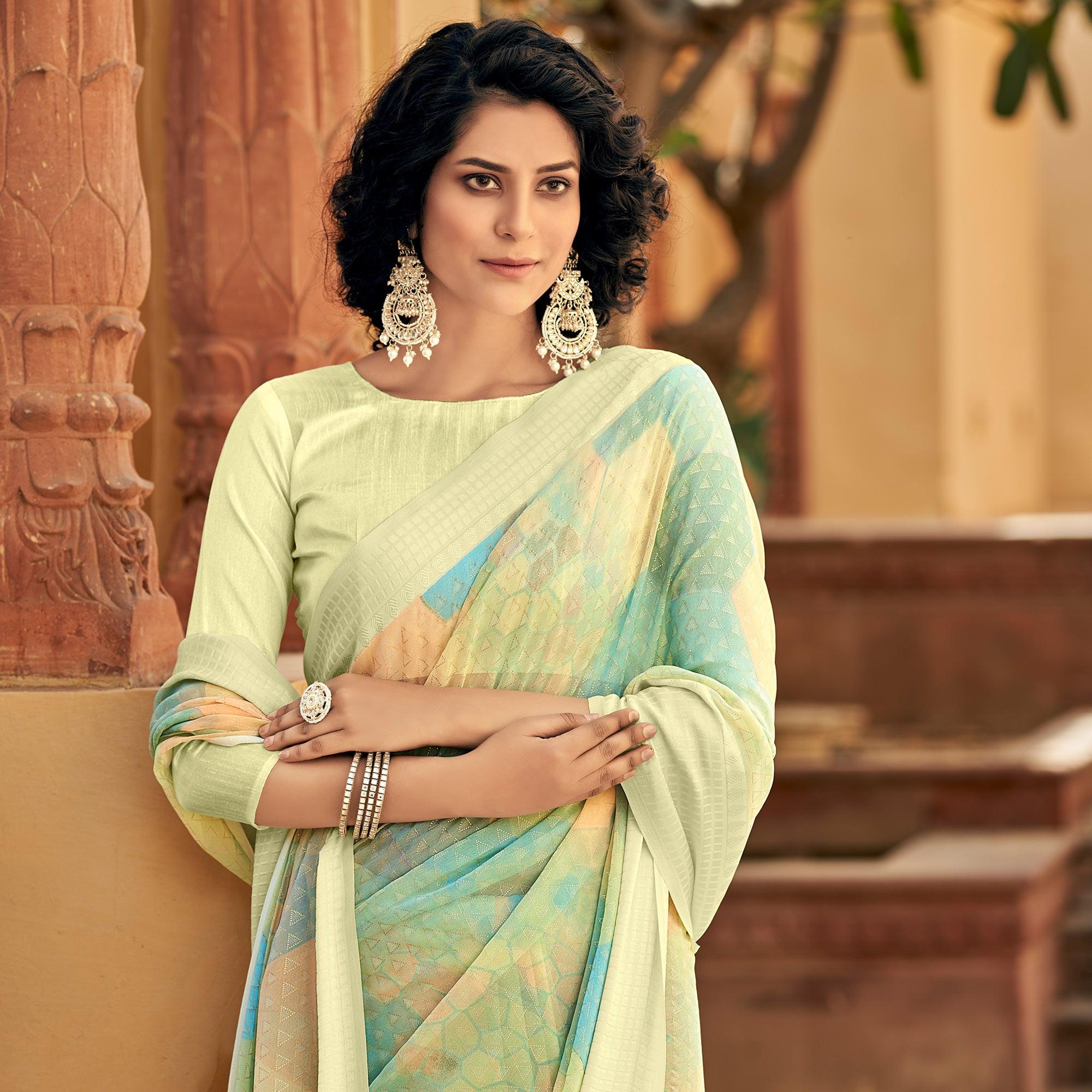 Multicolor Printed Georgette Saree With Tassels - Peachmode