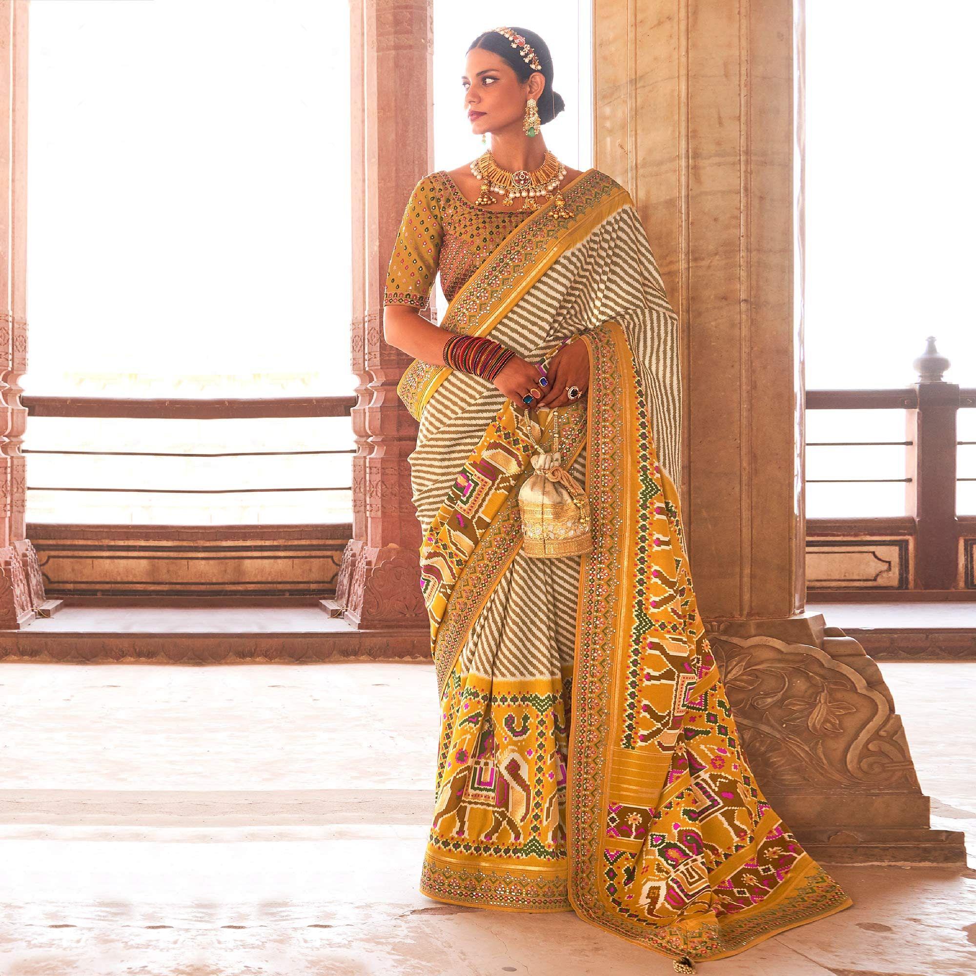 Mustard & Off White Patola Printed-Sequence Embroidered Pure Silk Saree - Peachmode