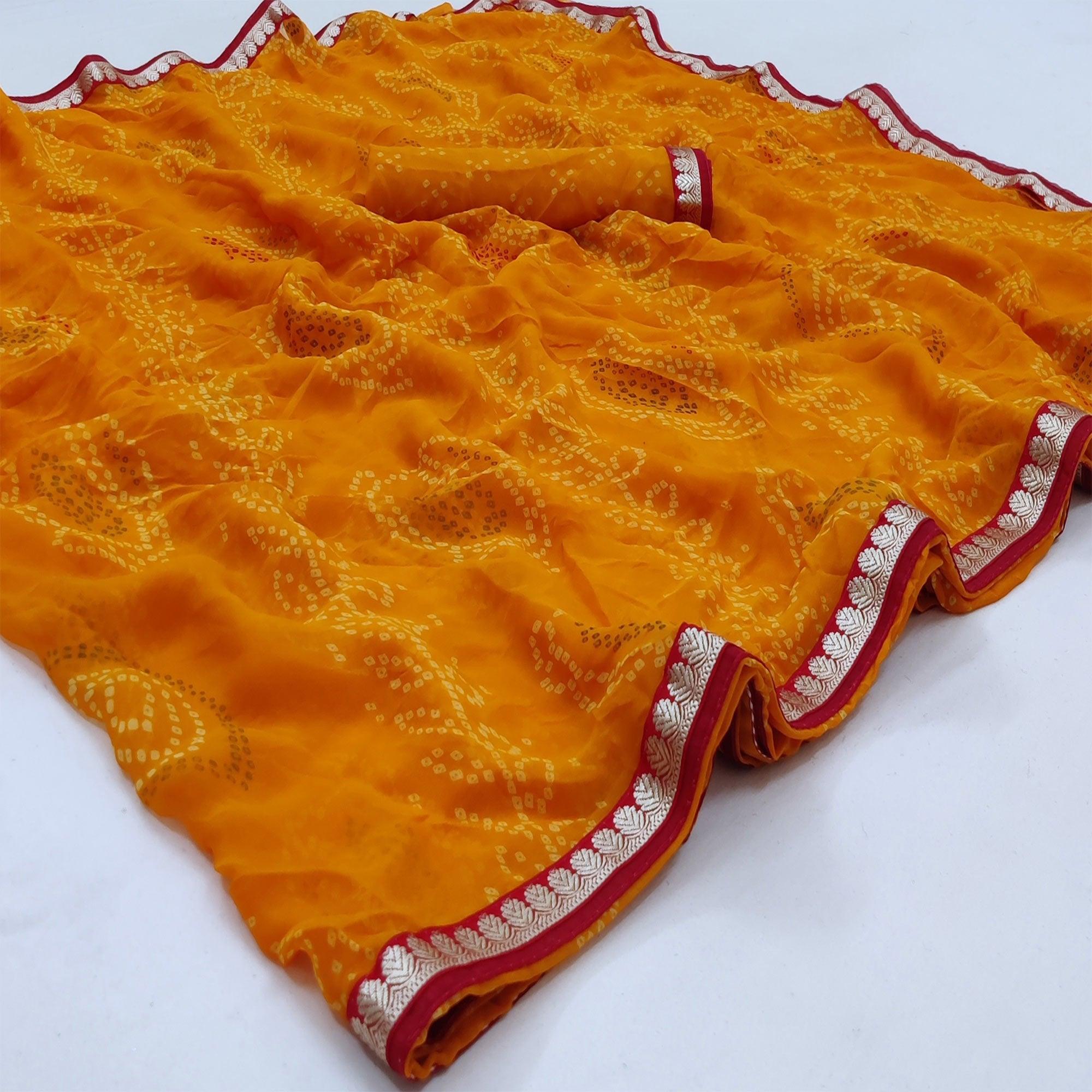 Mustard Casual Wear Bandhani Printed Soft Georgette Saree With Fancy Border - Peachmode