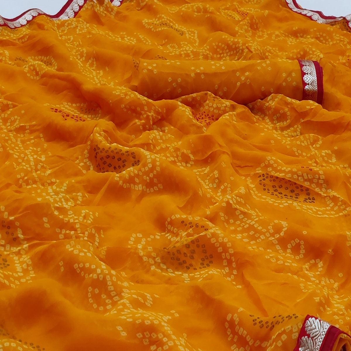 Mustard Casual Wear Bandhani Printed Soft Georgette Saree With Fancy Border - Peachmode
