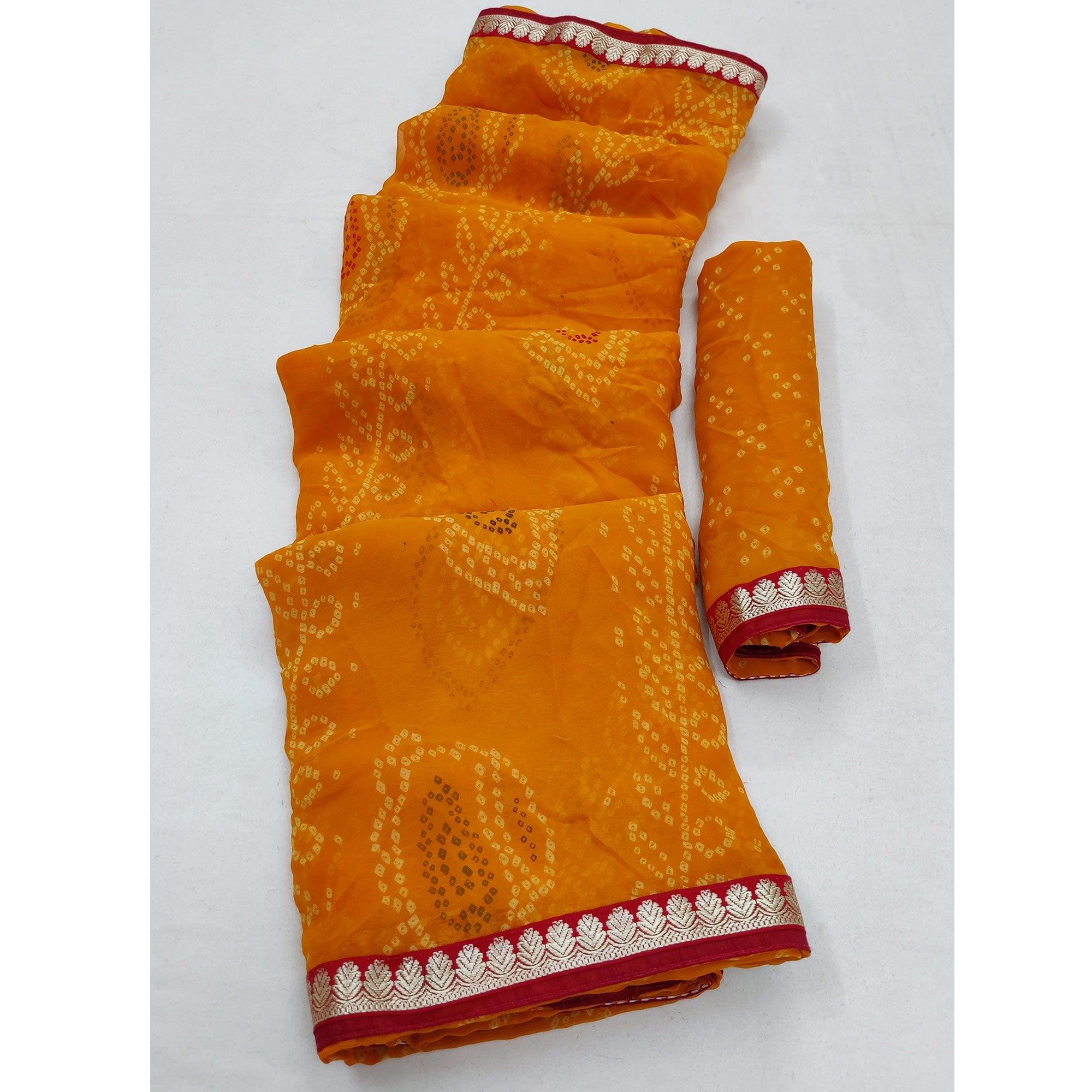 Mustard Casual Wear Bandhani Printed Soft Georgette Saree With Fancy Border - Peachmode
