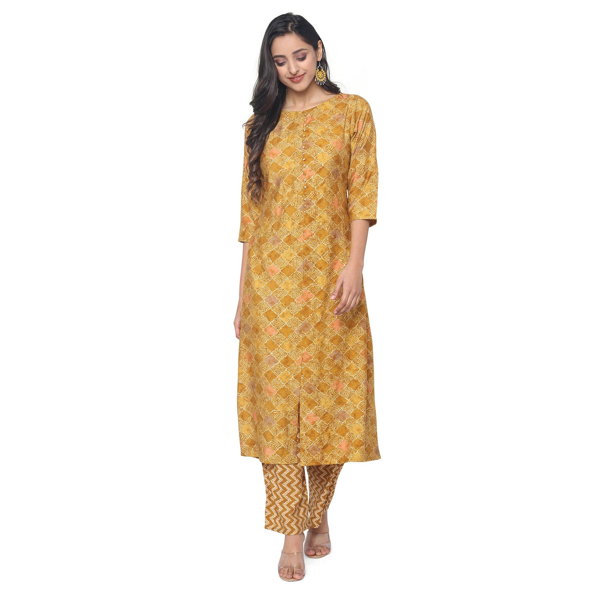Mustard Casual Wear Foil Printed Chanderi Modal Kurti Pant Set - Peachmode