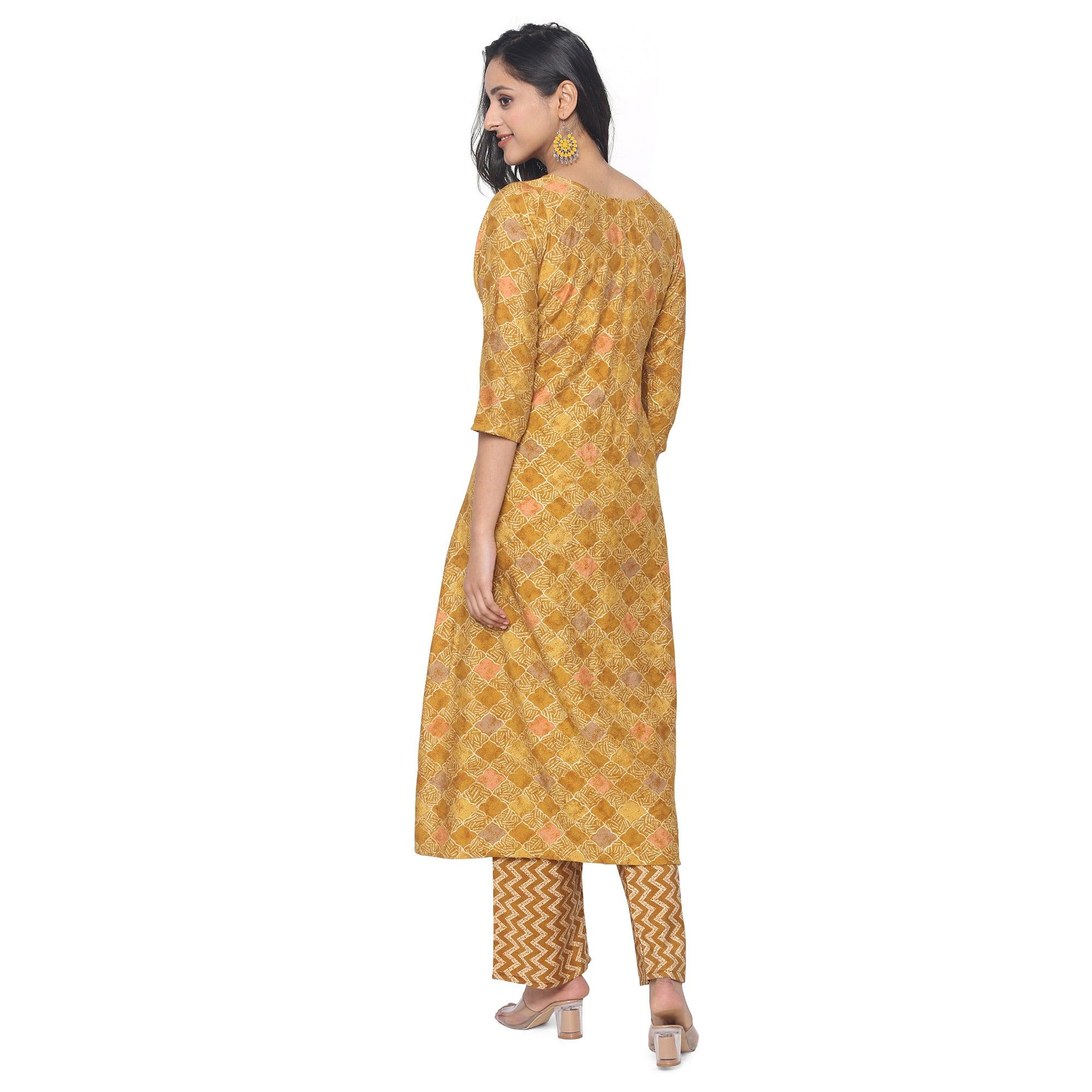 Mustard Casual Wear Foil Printed Chanderi Modal Kurti Pant Set - Peachmode