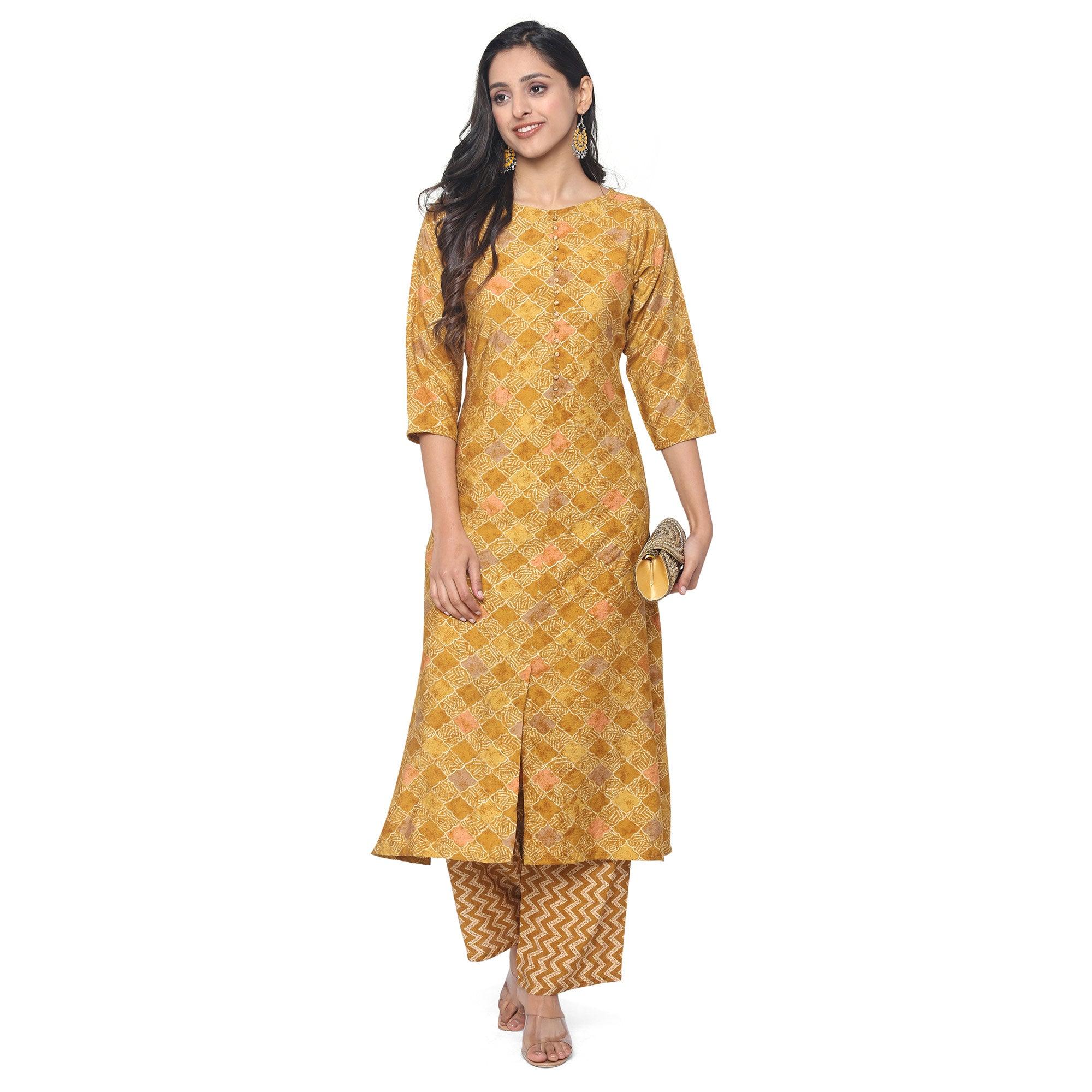 Mustard Casual Wear Foil Printed Chanderi Modal Kurti Pant Set - Peachmode