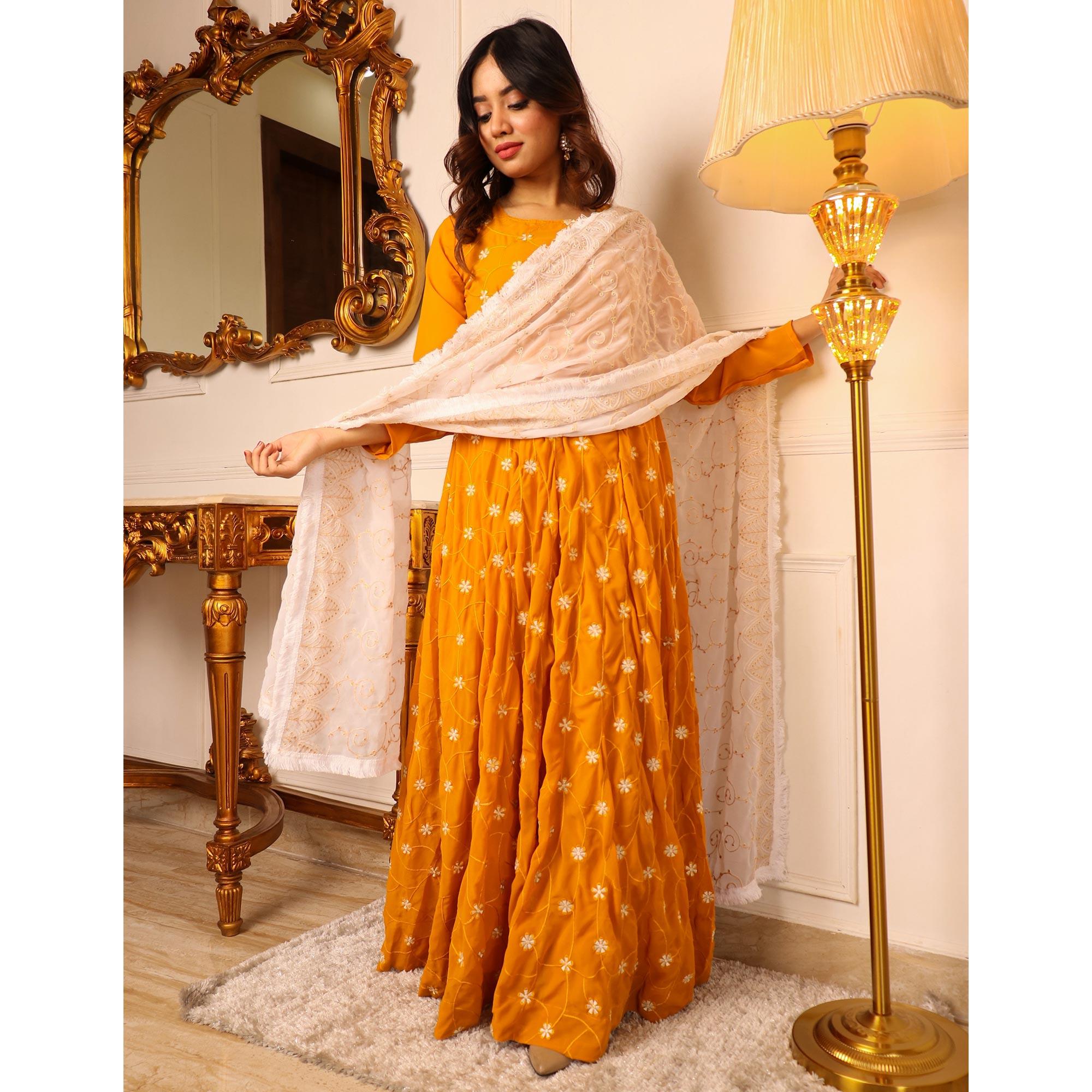 Mustard Floral Embroidered Georgette Gown With Dupatta - Peachmode