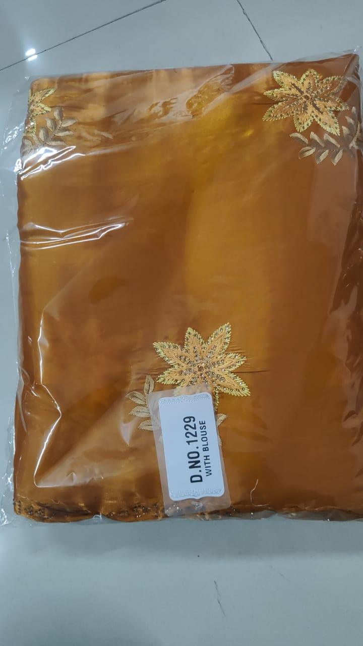 Mustard Floral Embroidered With Embellished Georgette Saree - Peachmode