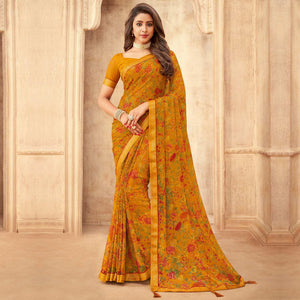 Mustard Floral Printed Chiffon Saree With Tassels - Peachmode