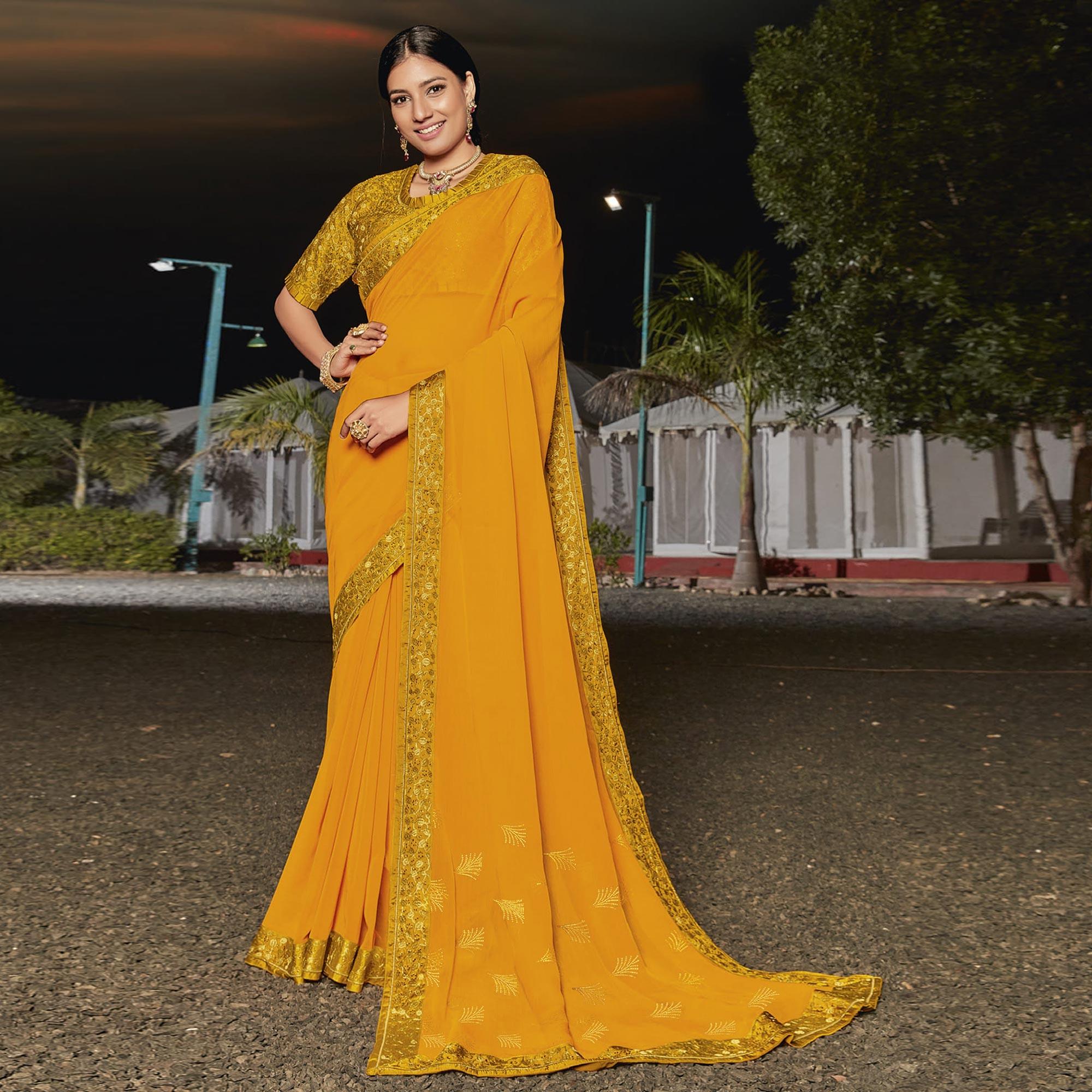 Mustard Partywear Embellished Georgette Saree - Peachmode