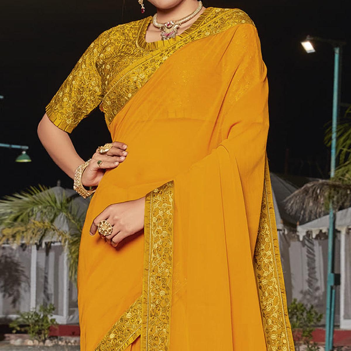 Mustard Partywear Embellished Georgette Saree - Peachmode
