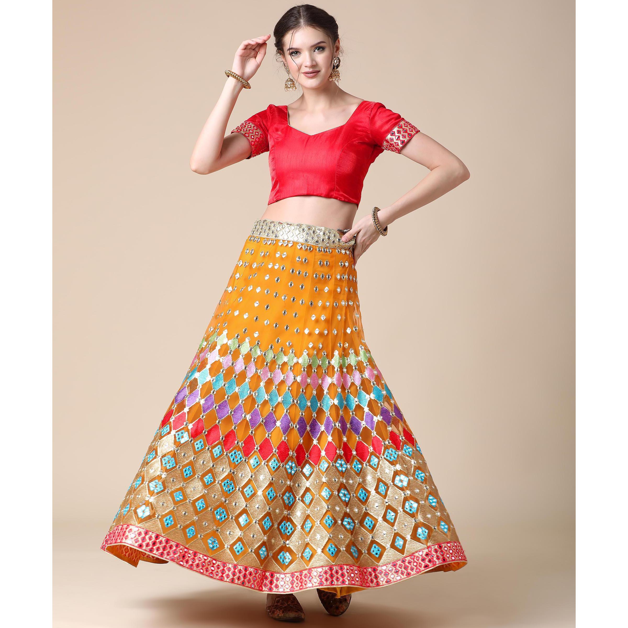 Mustard Partywear Embroidered & Mirror Work Heavy Soft Net Lehenga - Peachmode