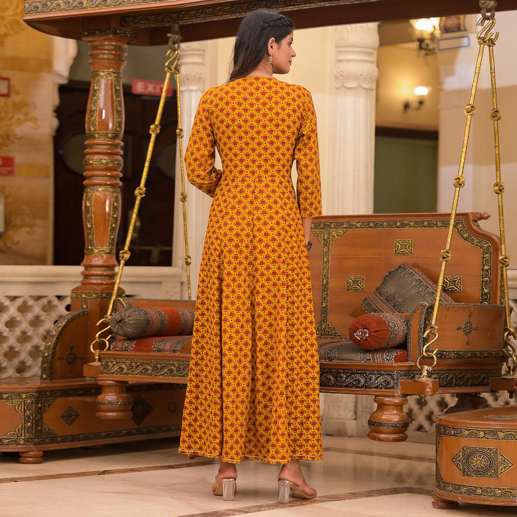 Mustard Printed Rayon Long Kurti - Peachmode