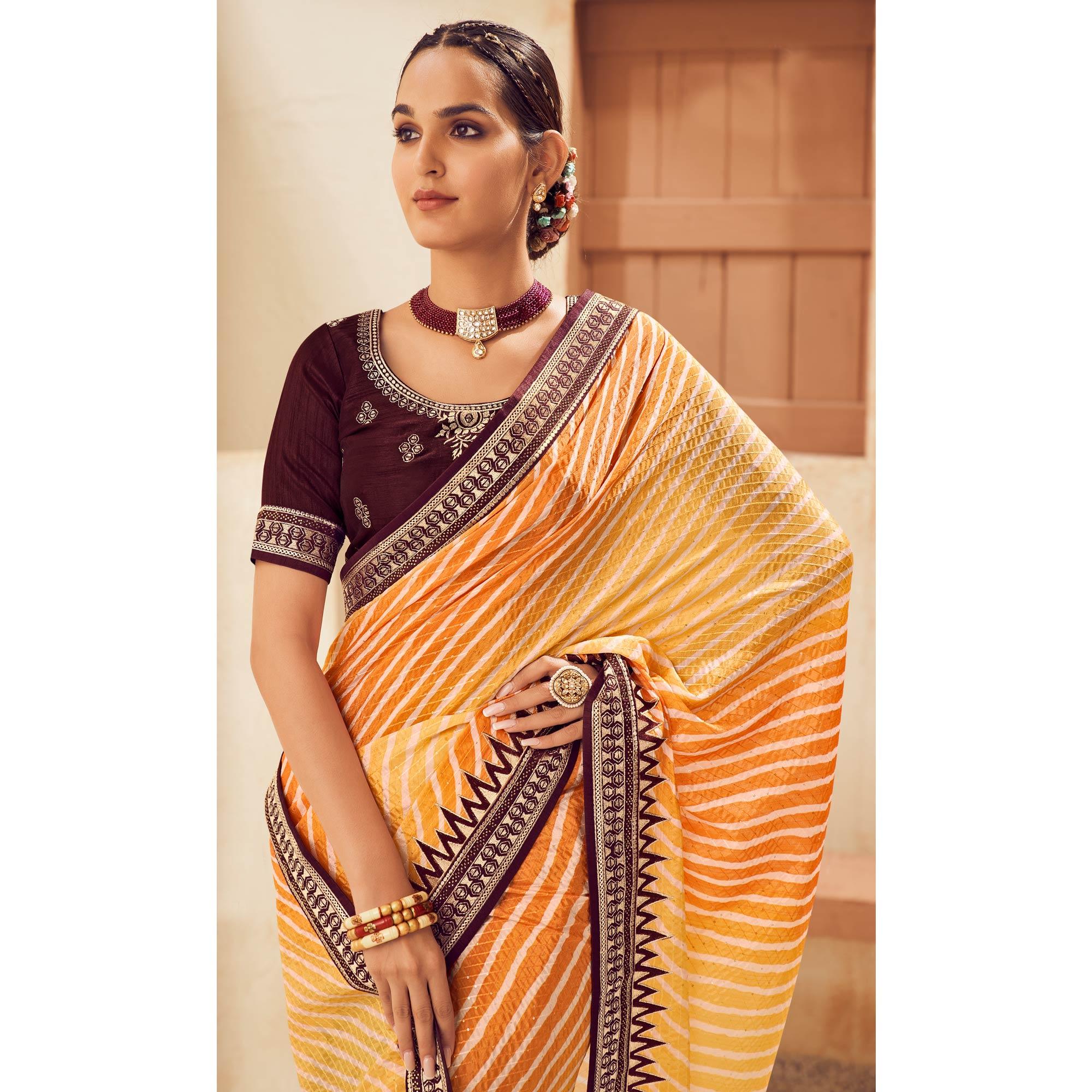 Mustard Printed With Embellished Chiffon Saree With Tassels - Peachmode