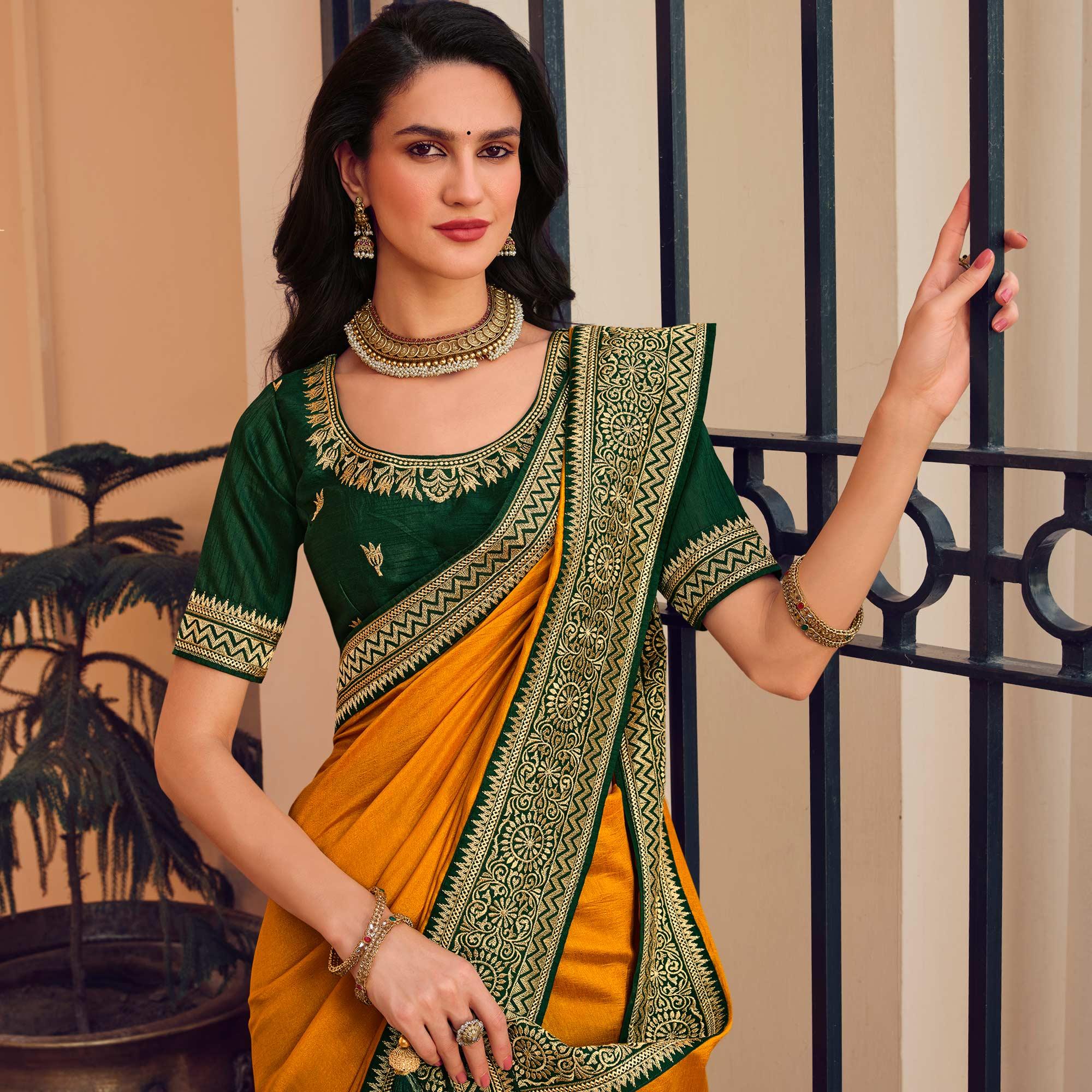 Mustard Solid Vichitra Silk Saree With Tassels - Peachmode