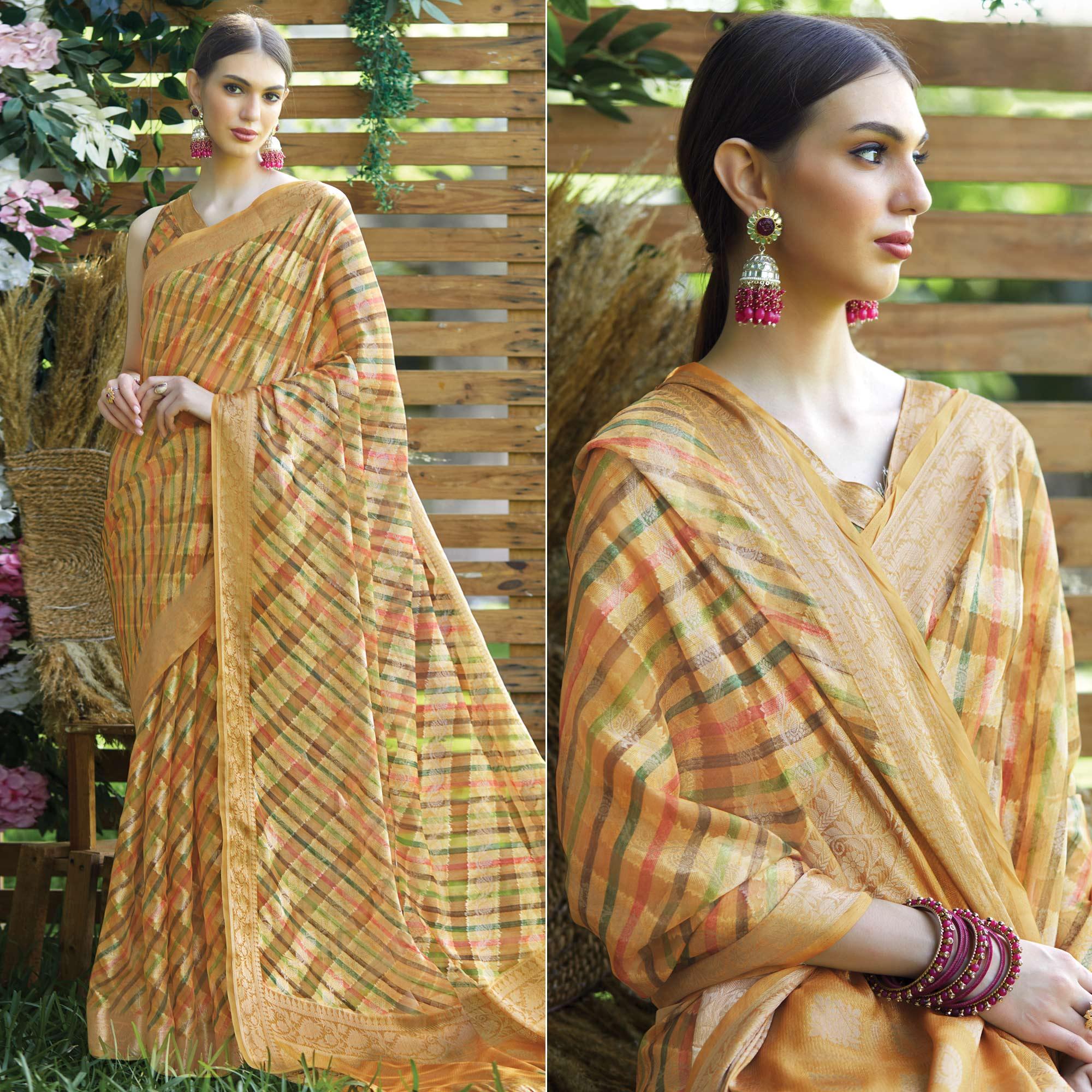 Mustard Striped Printed Art Silk Saree With Tassels - Peachmode
