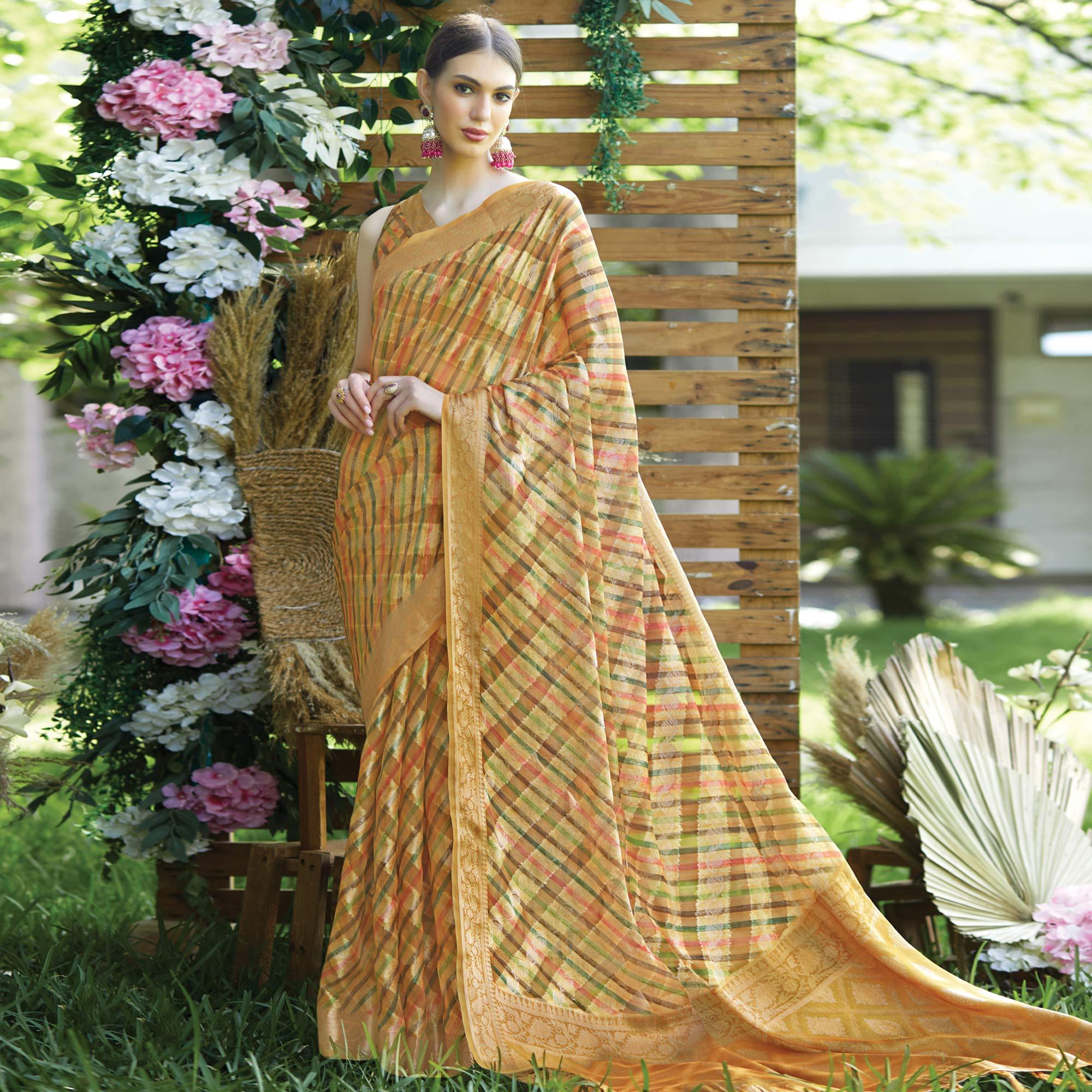 Mustard Striped Printed Art Silk Saree With Tassels - Peachmode