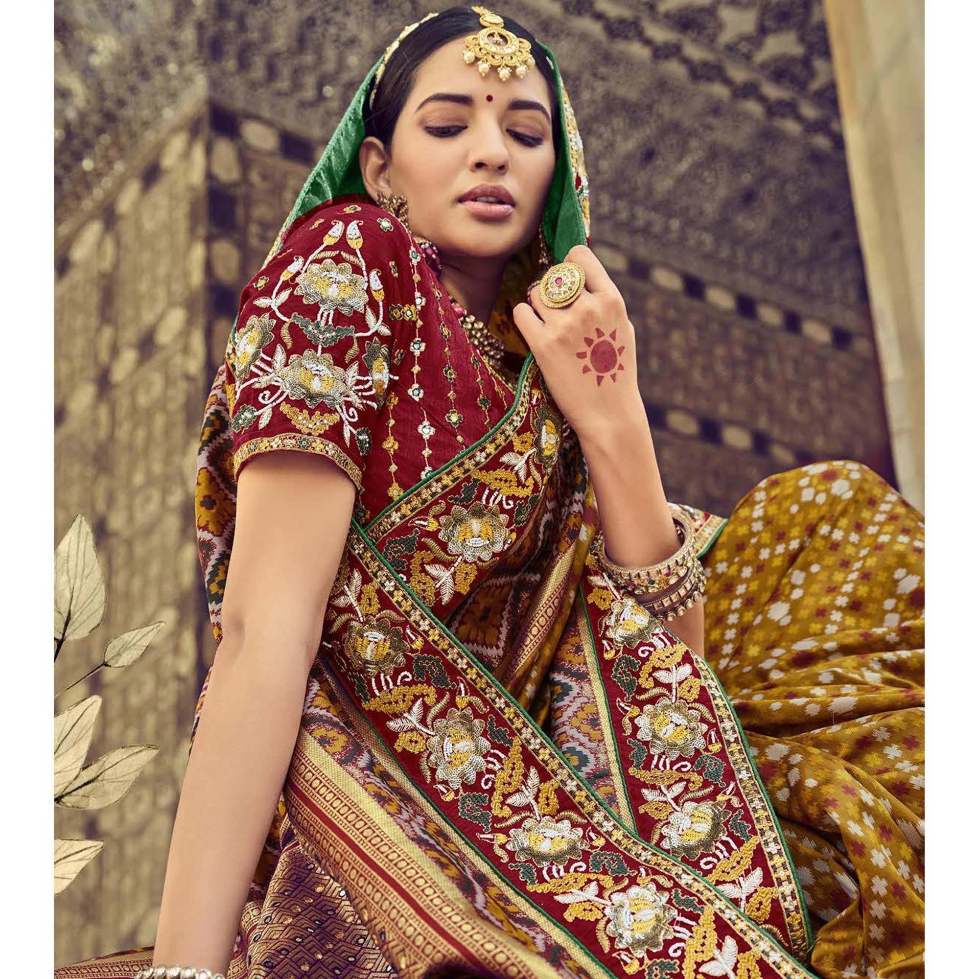 Mustard Wedding Wear Resham With Embellished Silk Bhandhani Patola Saree - Peachmode