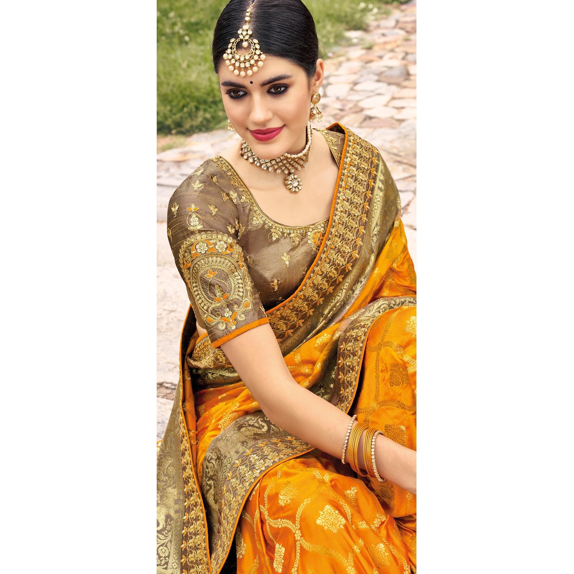 Mustard Woven Banarasi Silk Saree With Tassels - Peachmode