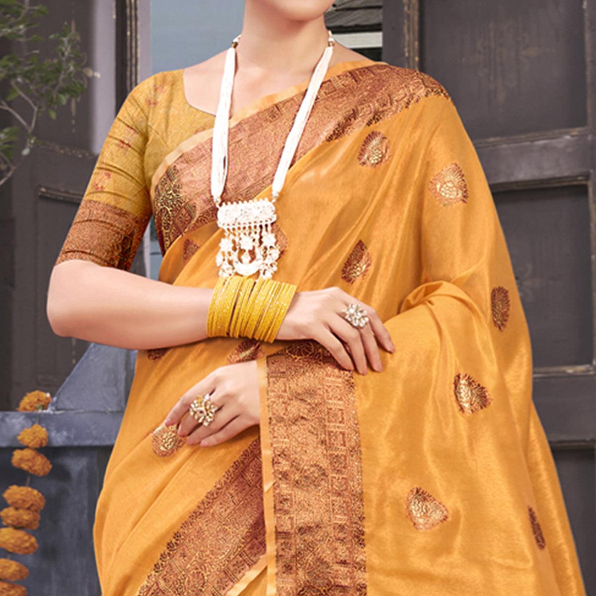 Mustard Woven Organza Saree With Tassels - Peachmode