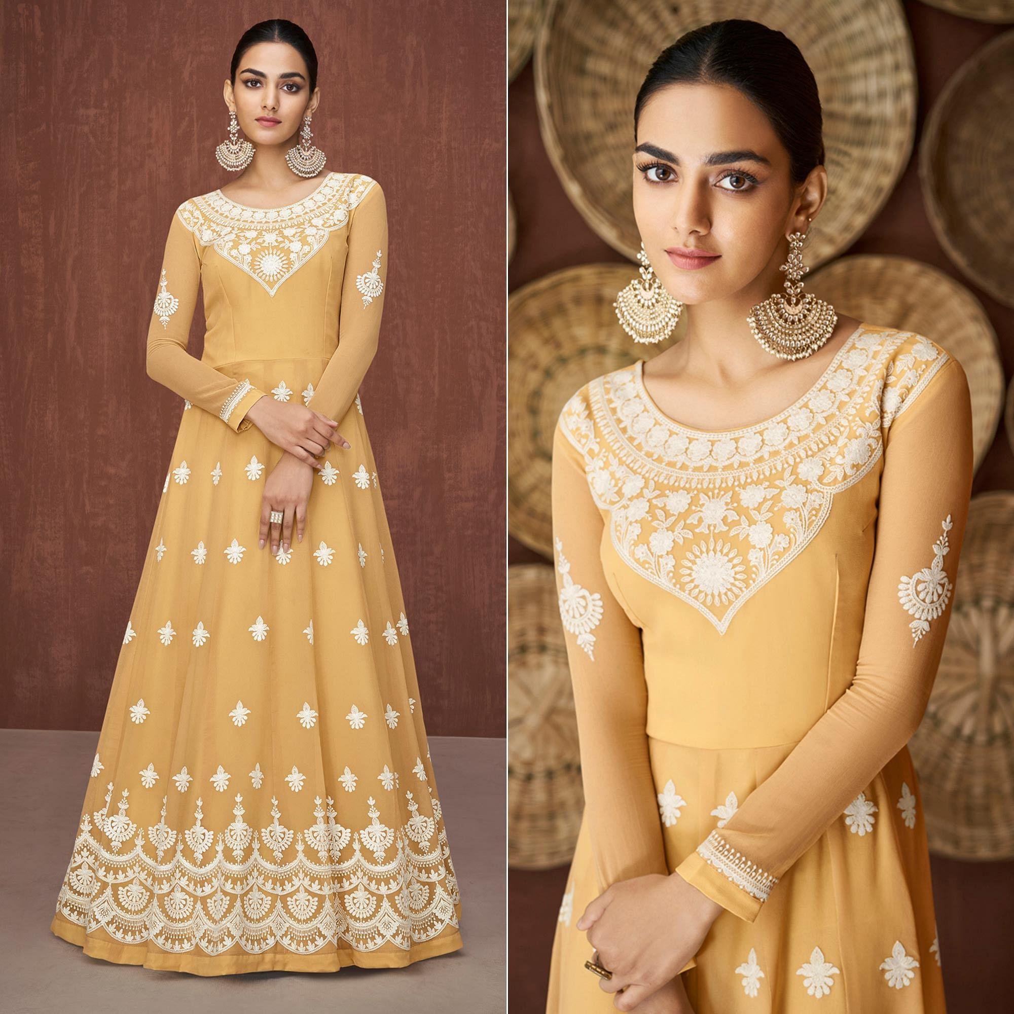 Mustard Yellow Party Wear Heavy Embroidered Georgette Gown - Peachmode