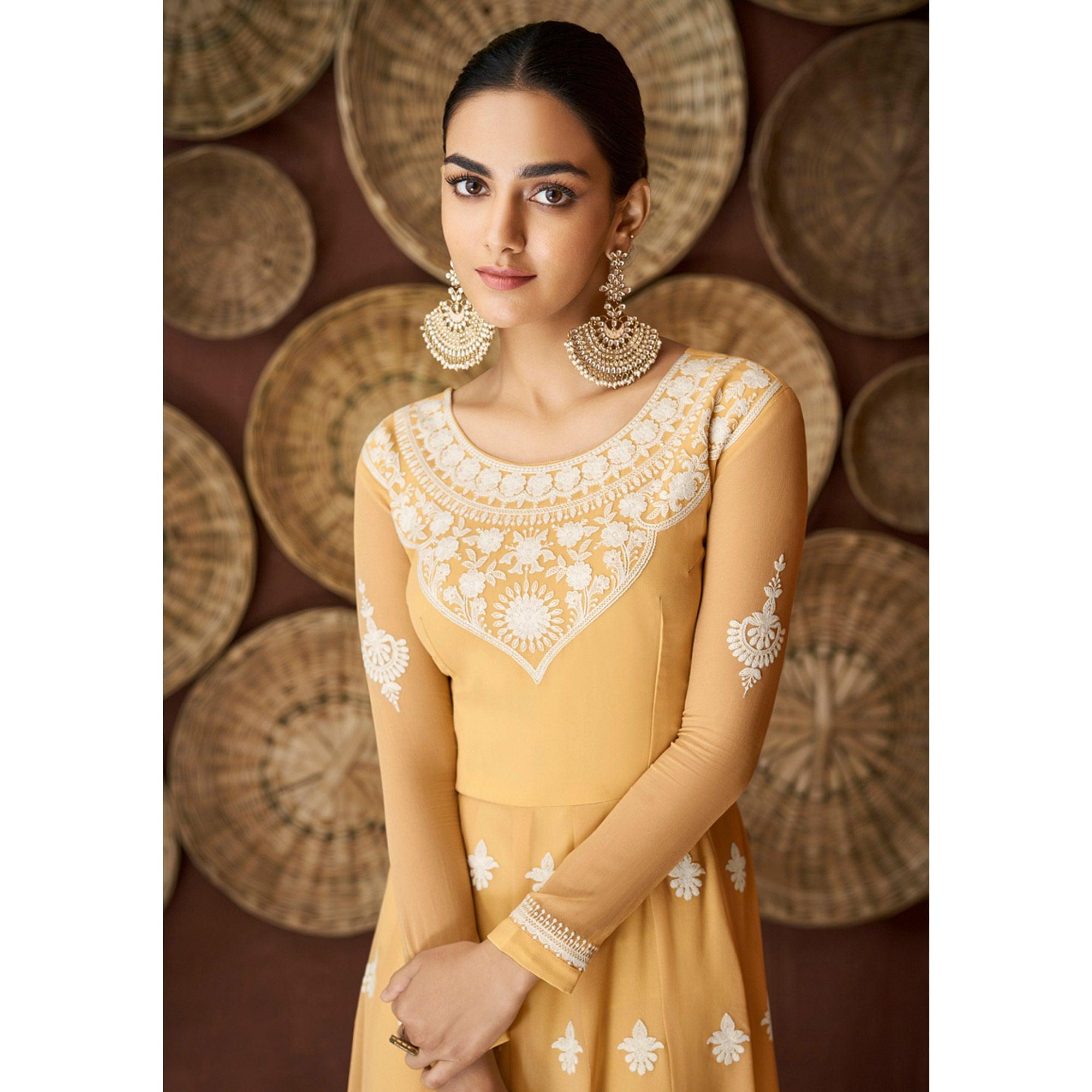 Mustard Yellow Party Wear Heavy Embroidered Georgette Gown - Peachmode