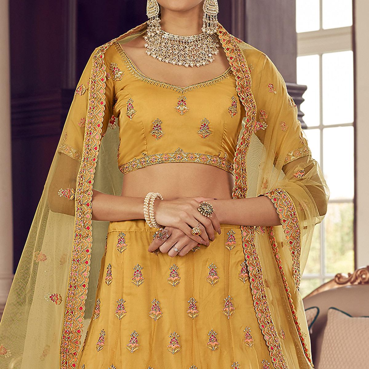 Mustard-Yellow Partywear Embroidered Organza Lehenga Choli - Peachmode