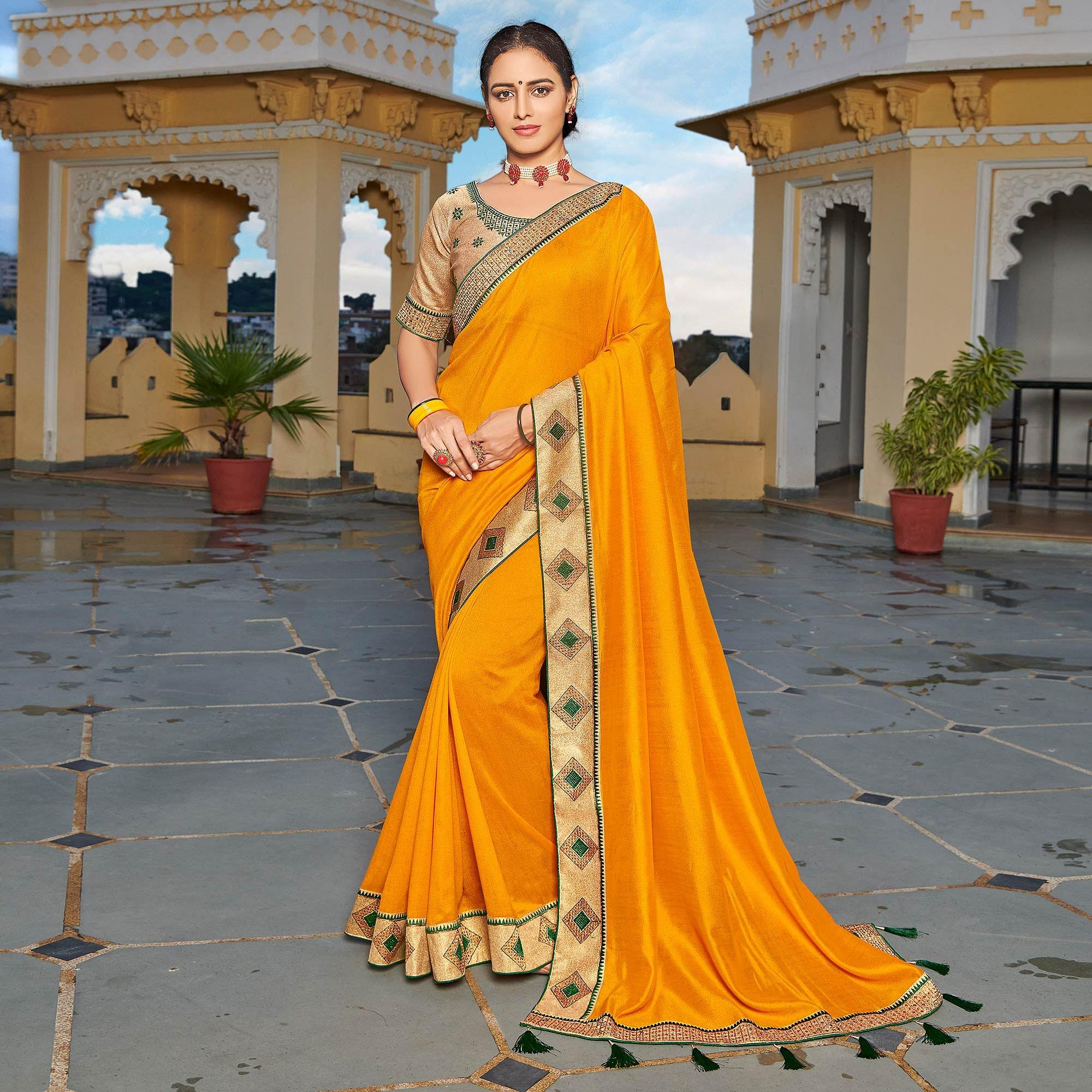 Mustard Yellow Solid-Embroidered Border Vichitra Silk Saree With Tassels - Peachmode