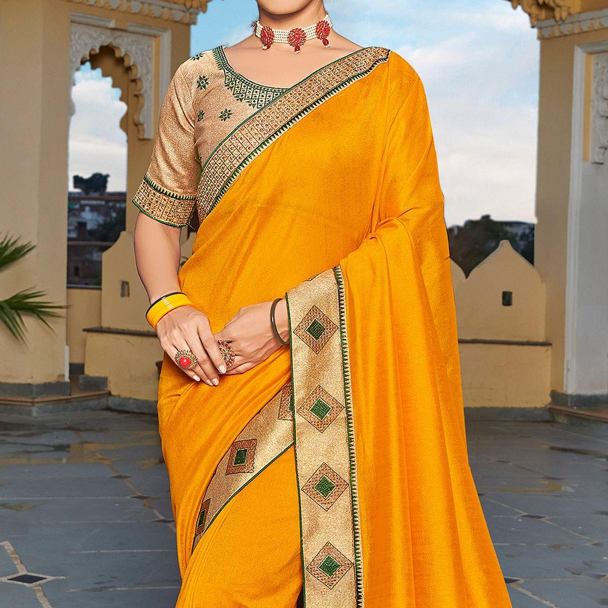 Mustard Yellow Solid-Embroidered Border Vichitra Silk Saree With Tassels - Peachmode