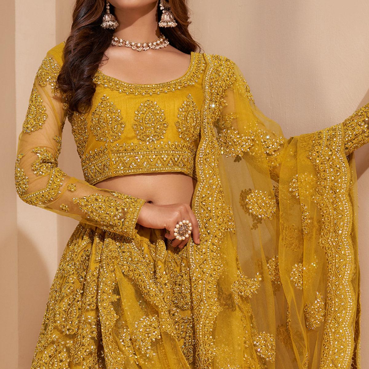 Mustard-Yellow Wedding Wear Embroidered With Embellished Net Lehenga Choli - Peachmode