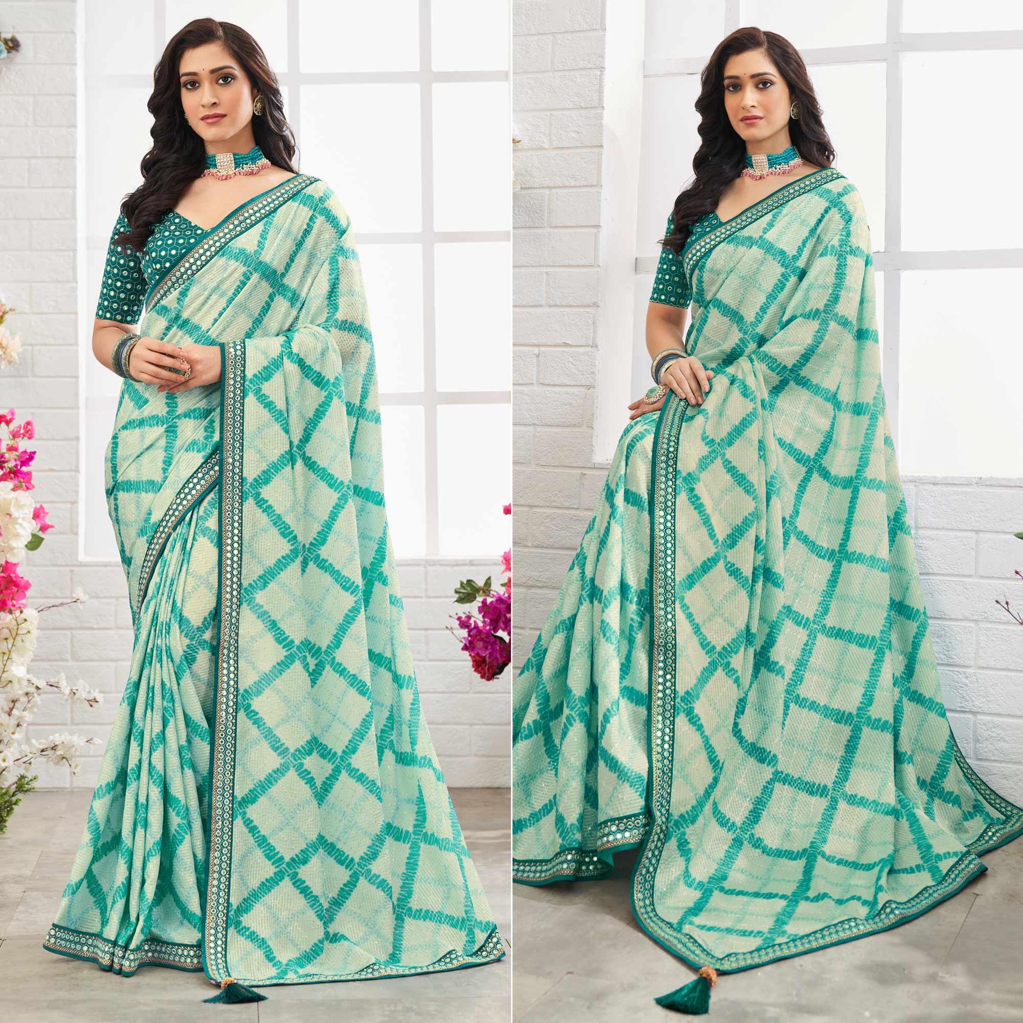 Off White-Blue Printed With Embellished Chiffon Saree With Tassels - Peachmode