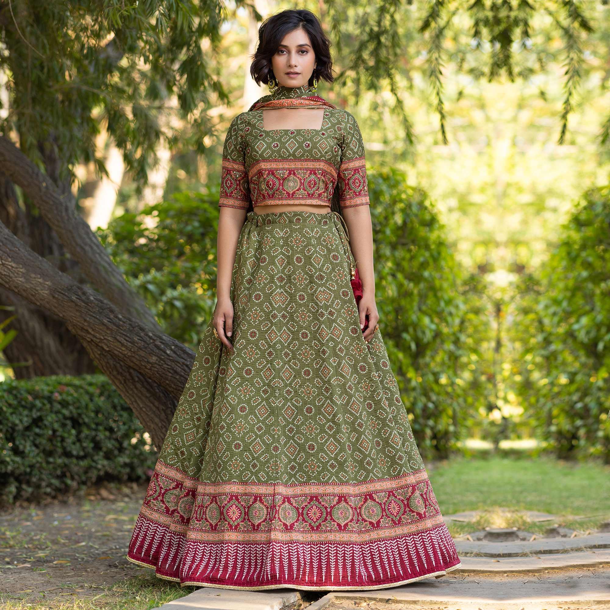 Olive Green Festive Wear Bandhani Printed With Sequence Muslin Lehenga Choli - Peachmode