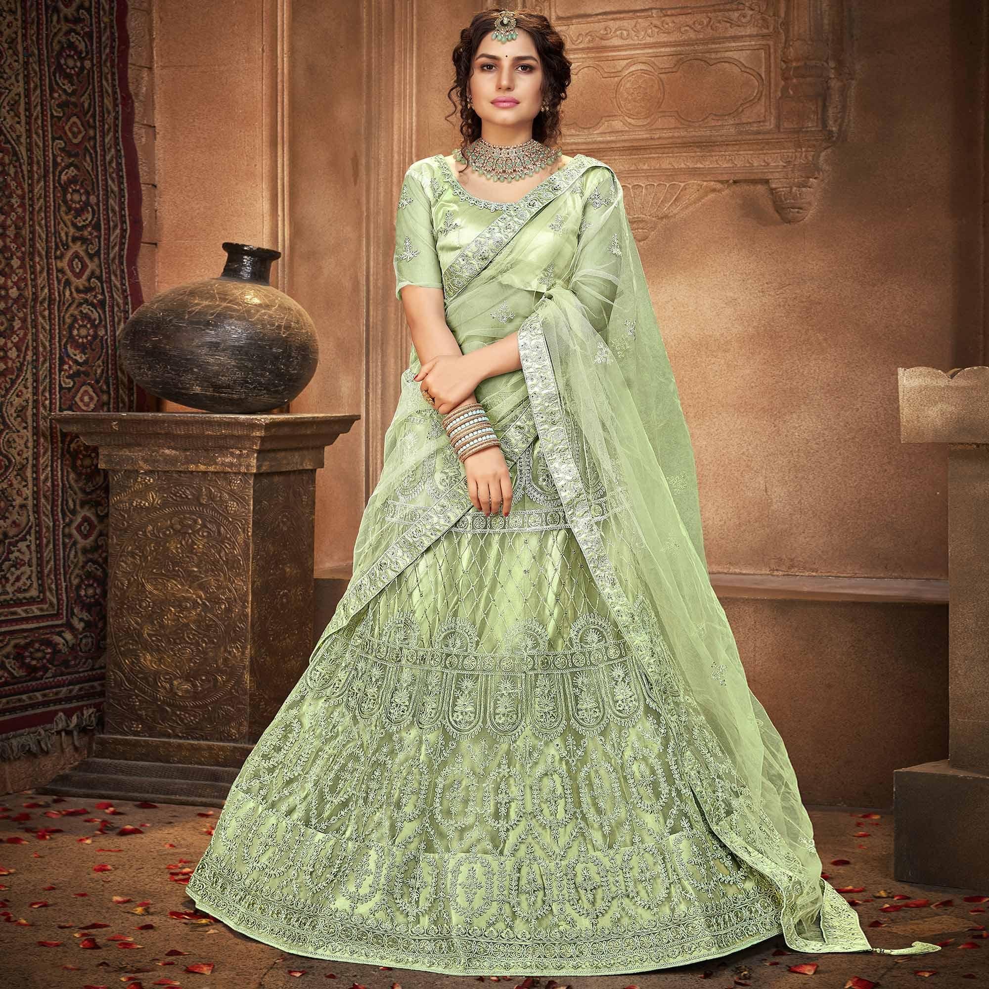 Olive Green Partywear Multi Sequence Embroidered Net Lehenga Choli - Peachmode