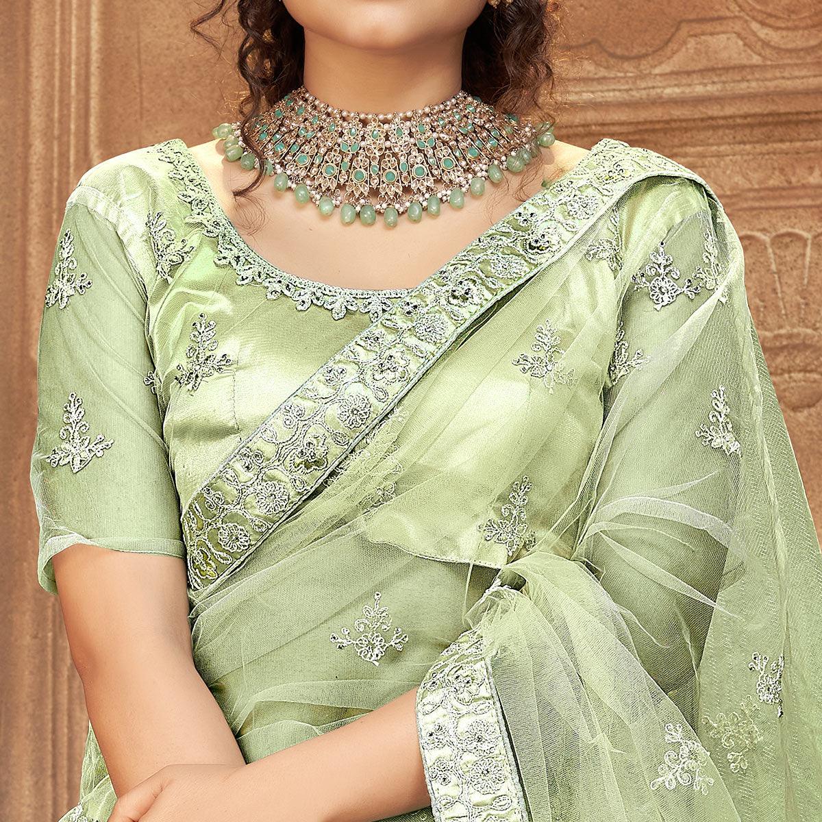 Olive Green Partywear Multi Sequence Embroidered Net Lehenga Choli - Peachmode