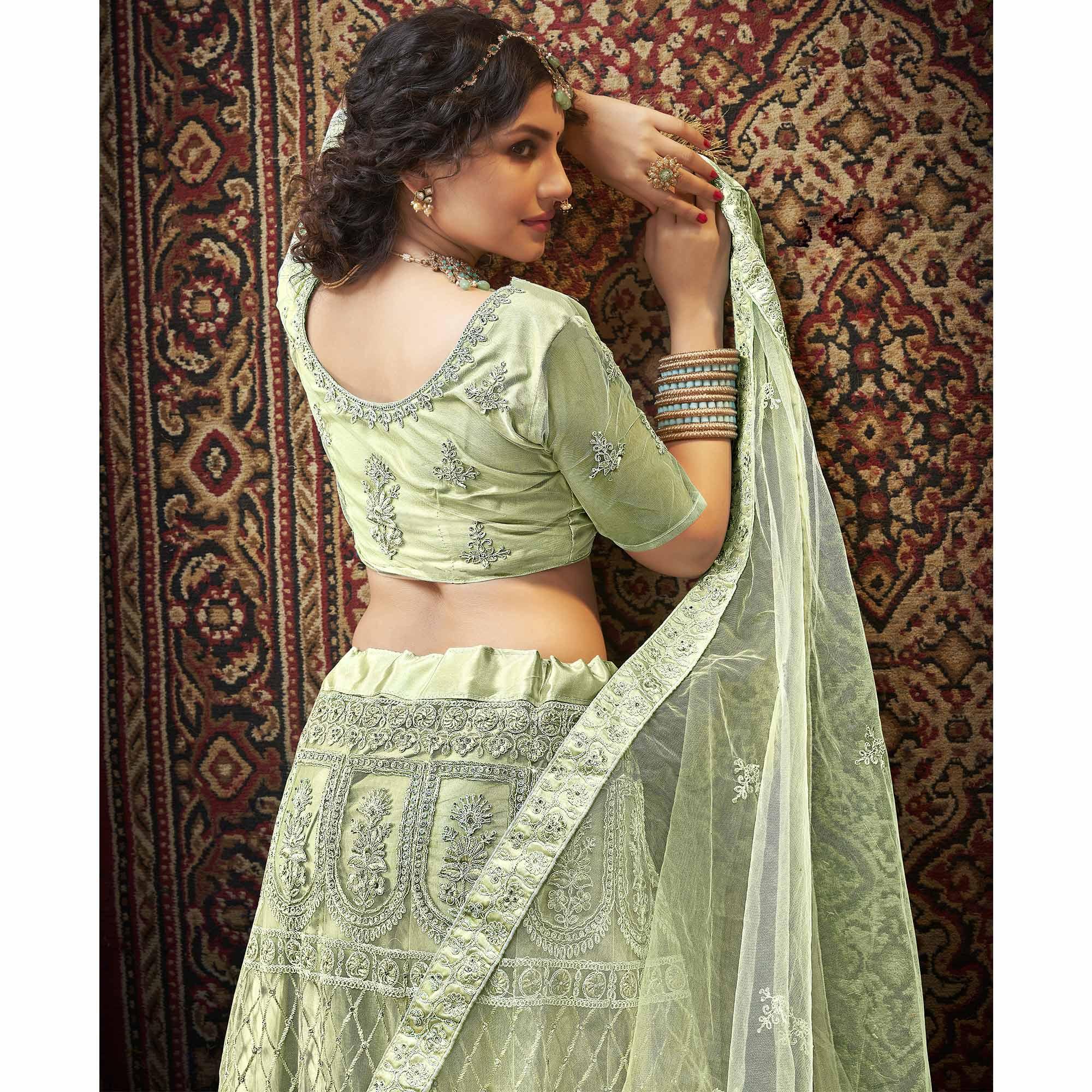 Olive Green Partywear Multi Sequence Embroidered Net Lehenga Choli - Peachmode