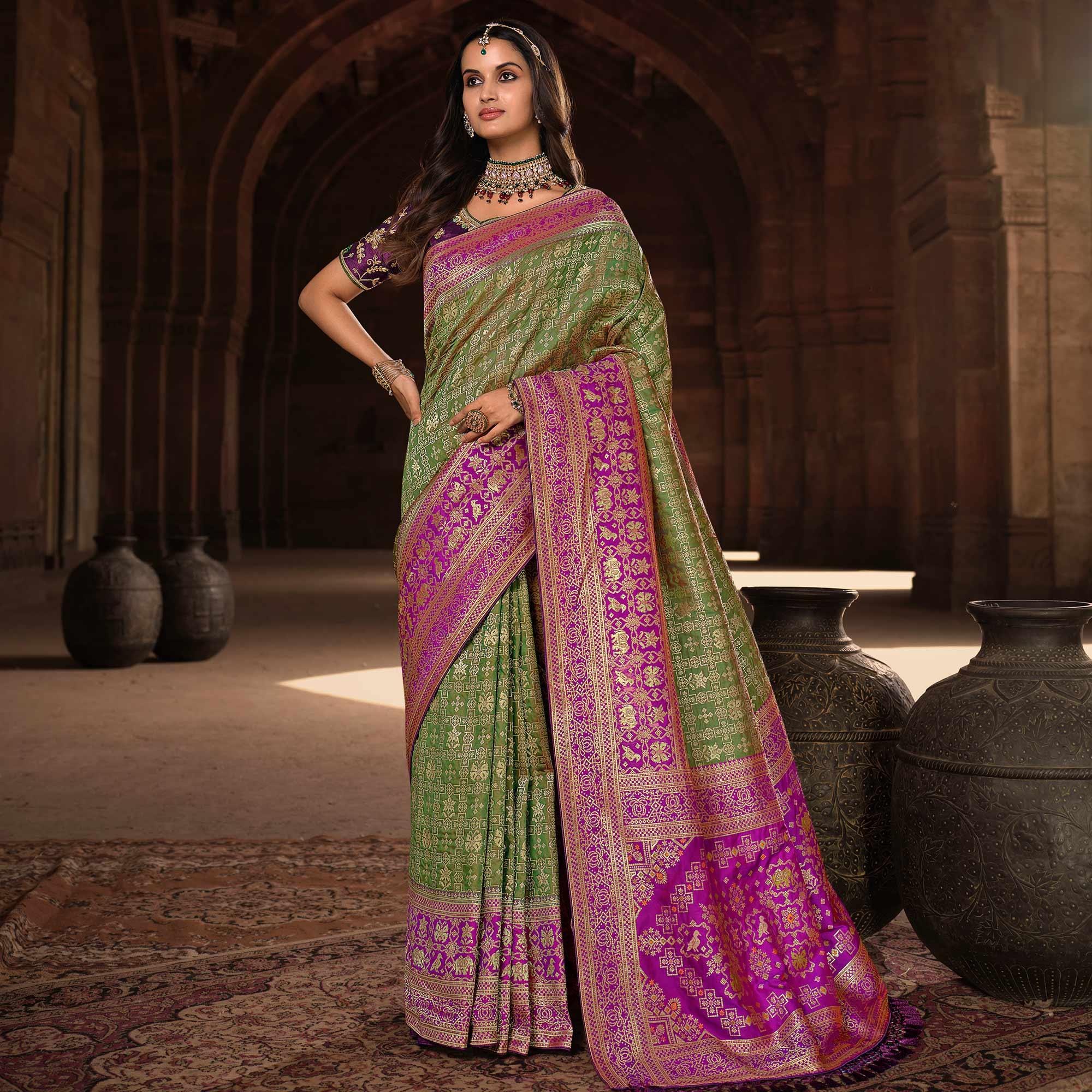 Olive Green Woven Banarasi Silk Saree With Tassels - Peachmode