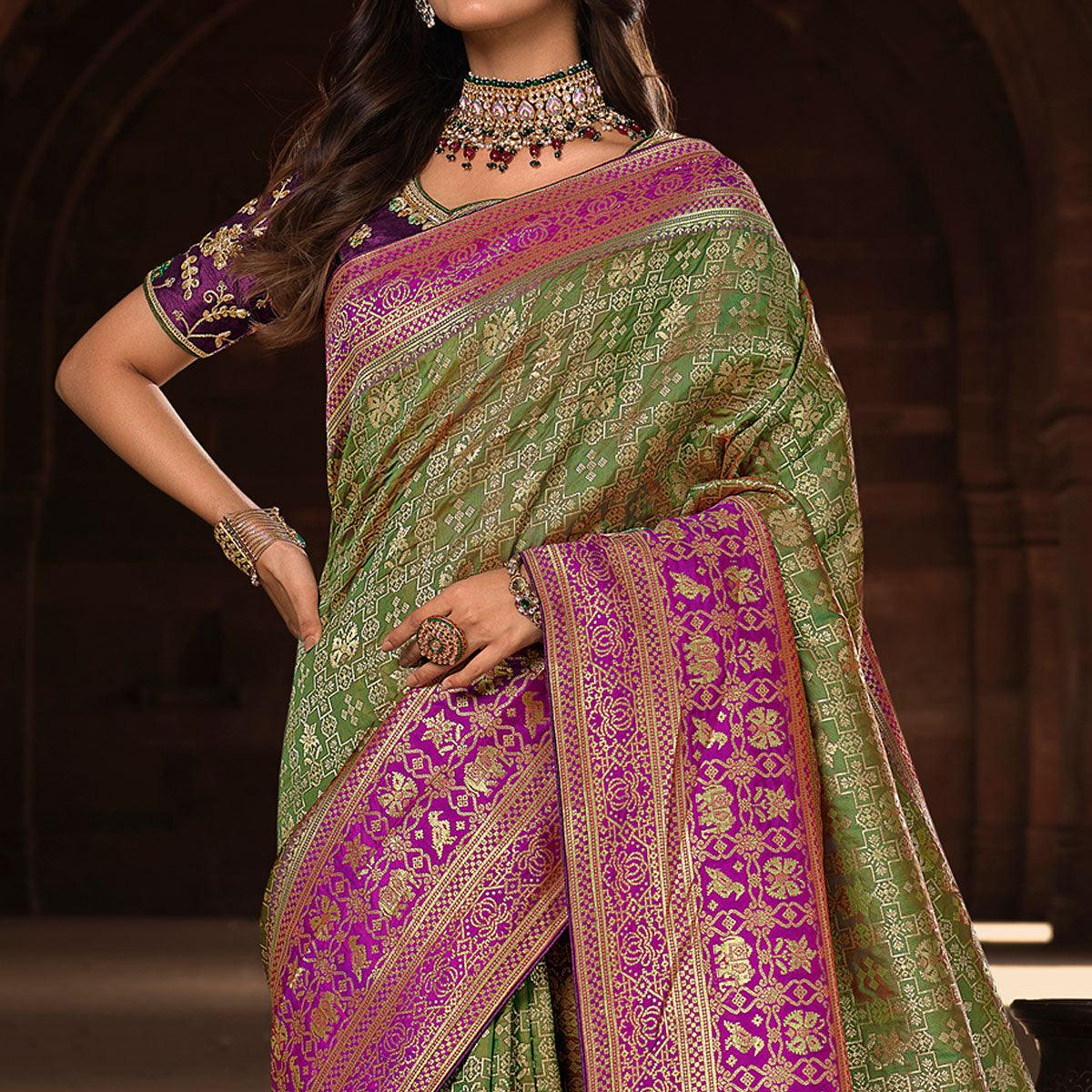 Olive Green Woven Banarasi Silk Saree With Tassels - Peachmode