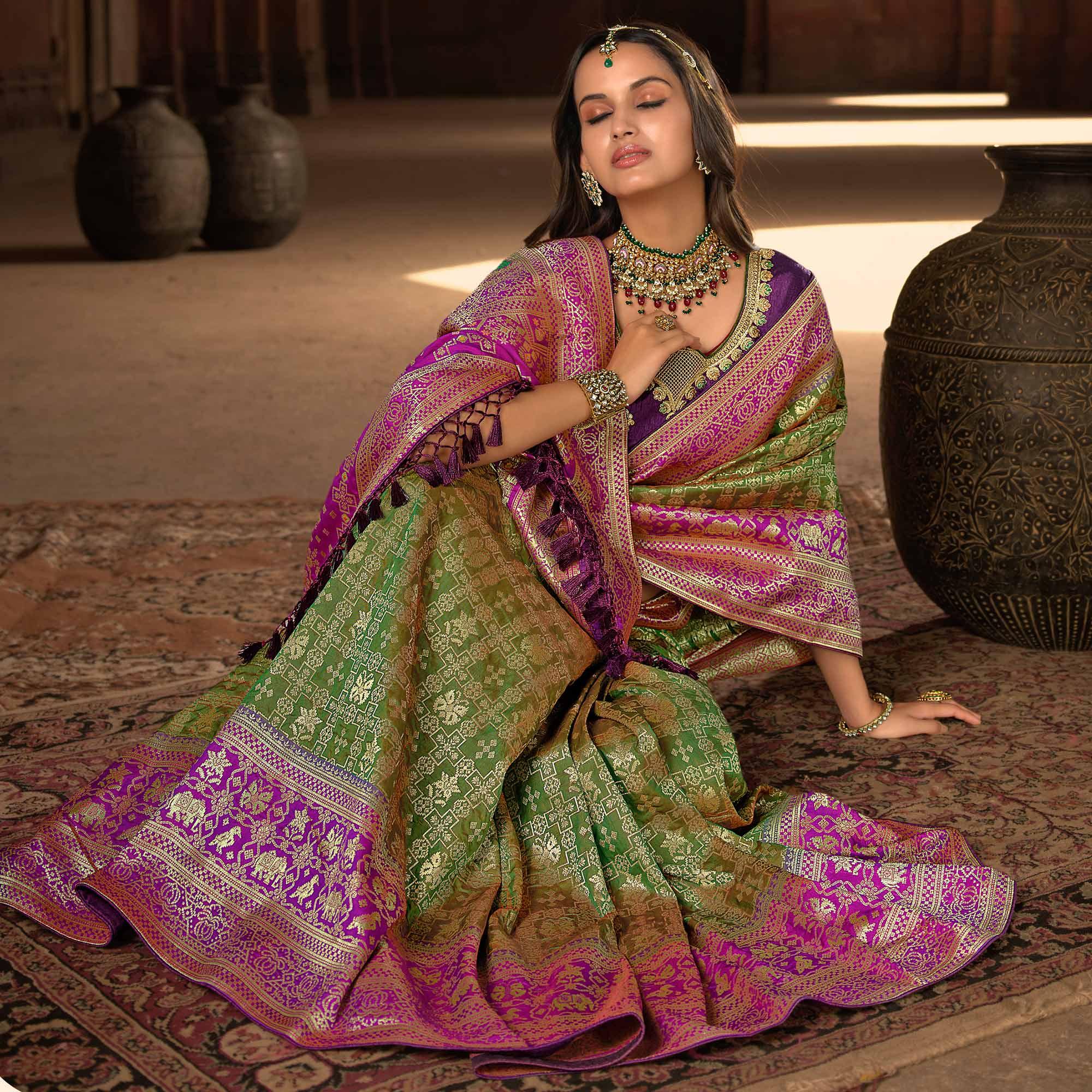 Olive Green Woven Banarasi Silk Saree With Tassels - Peachmode
