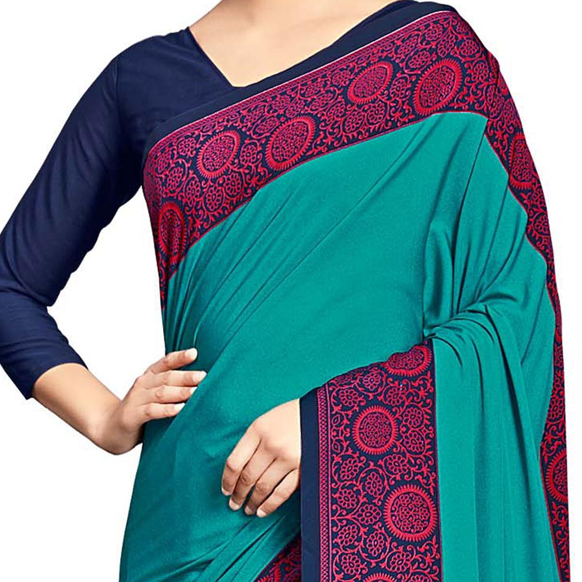 Opulent Turquoise Green Colored Casual Wear Printed Crepe Saree - Peachmode